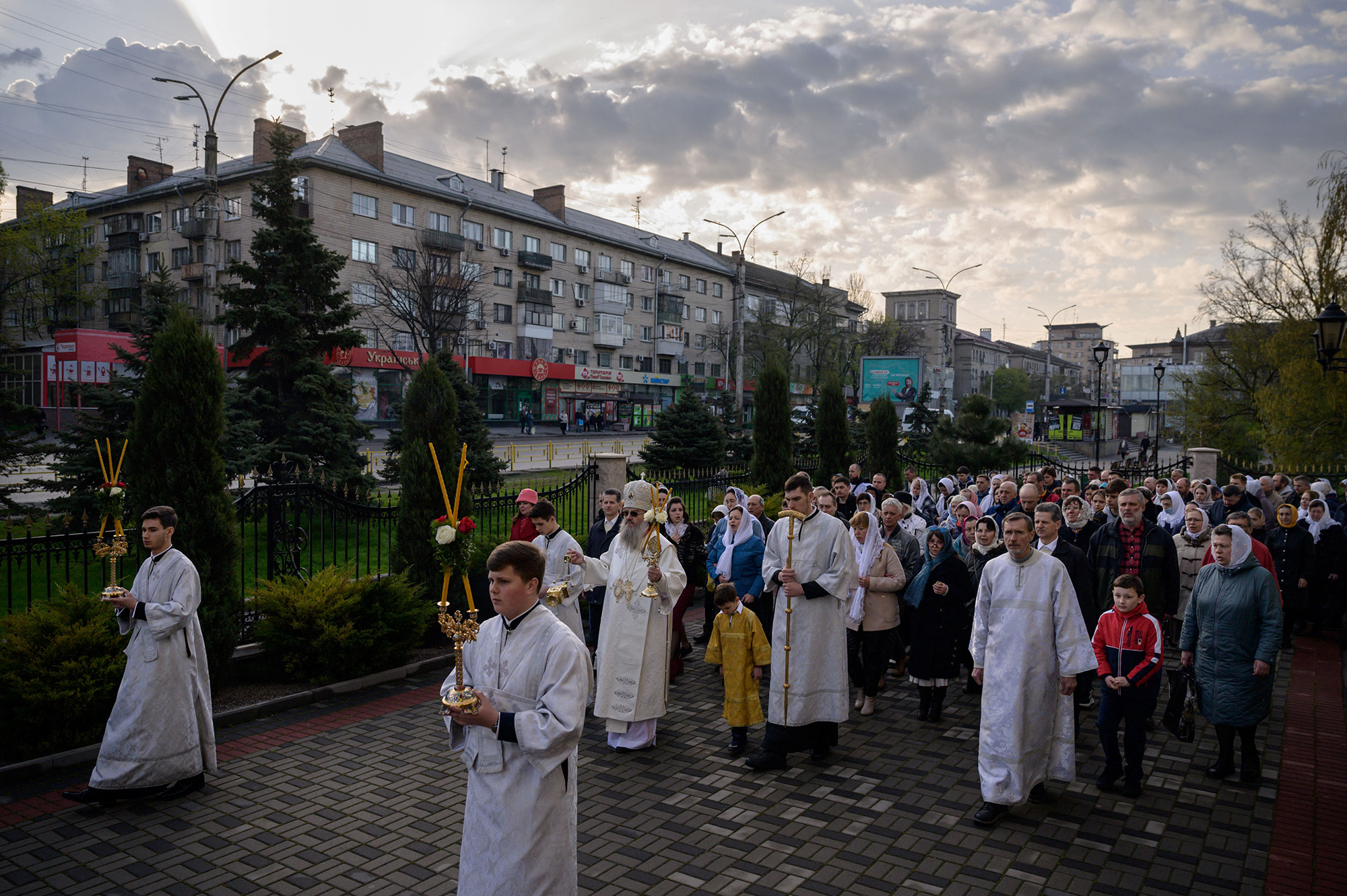 Worshippers take part in a procession as they mark orthodox easter day at the cathedral of the Holy Protection of the Orthodox Church of the Moscow Patriarchate, in the southern city of Zaporizhzhia, Ukraine, on April 24.