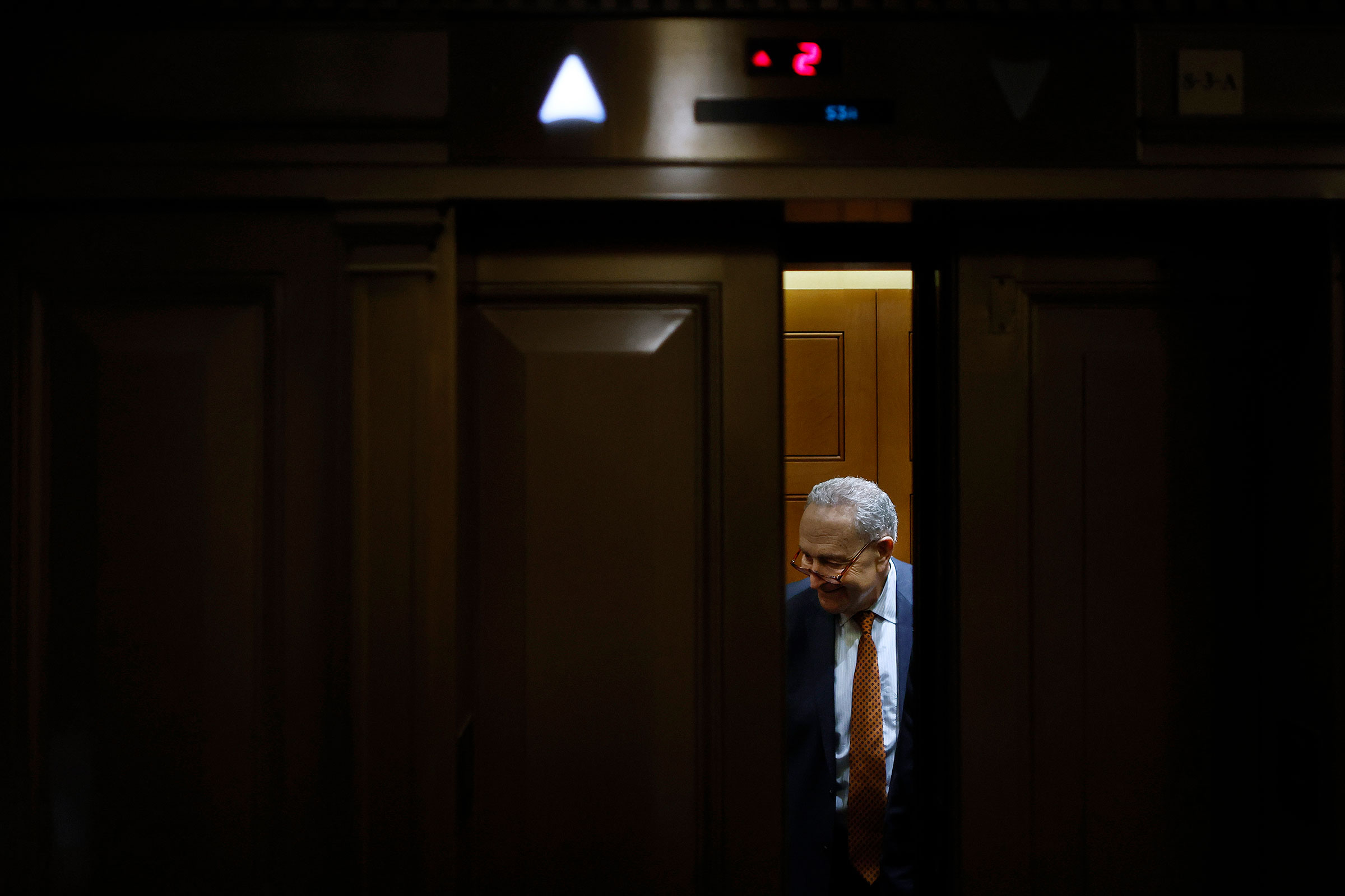Senate Majority Leader Chuck Schumer boards an elevator at the US Capitol on February 12 in Washington, DC. 