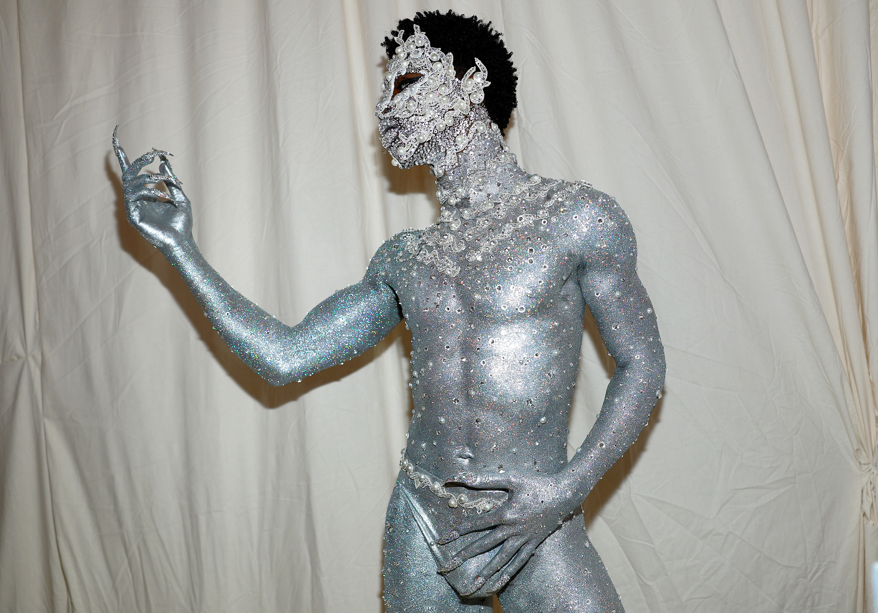 15) Lil Nas X, covered in rhinestones and pearls, shines on the Met Gala  carpet