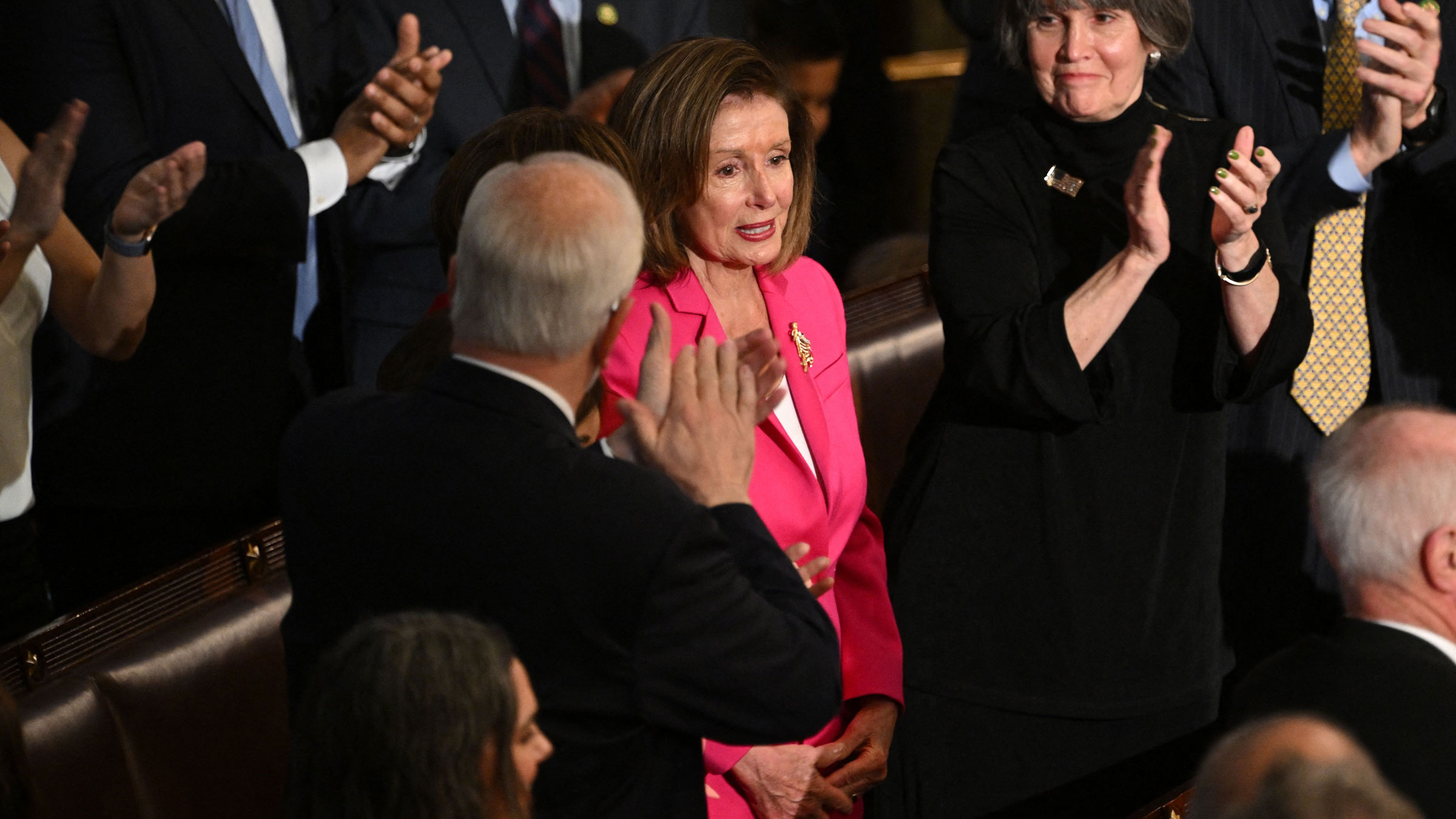 Outgoing House Speaker Nancy Pelosi acknowledges applause on Tuesday.
