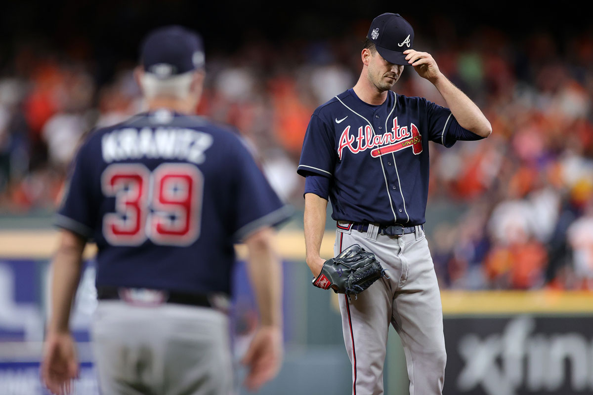 Drew Smyly of the Atlanta Braves receives a mound visit from Rick Kranitz during the seventh inning against the Houston Astros in Game 2.