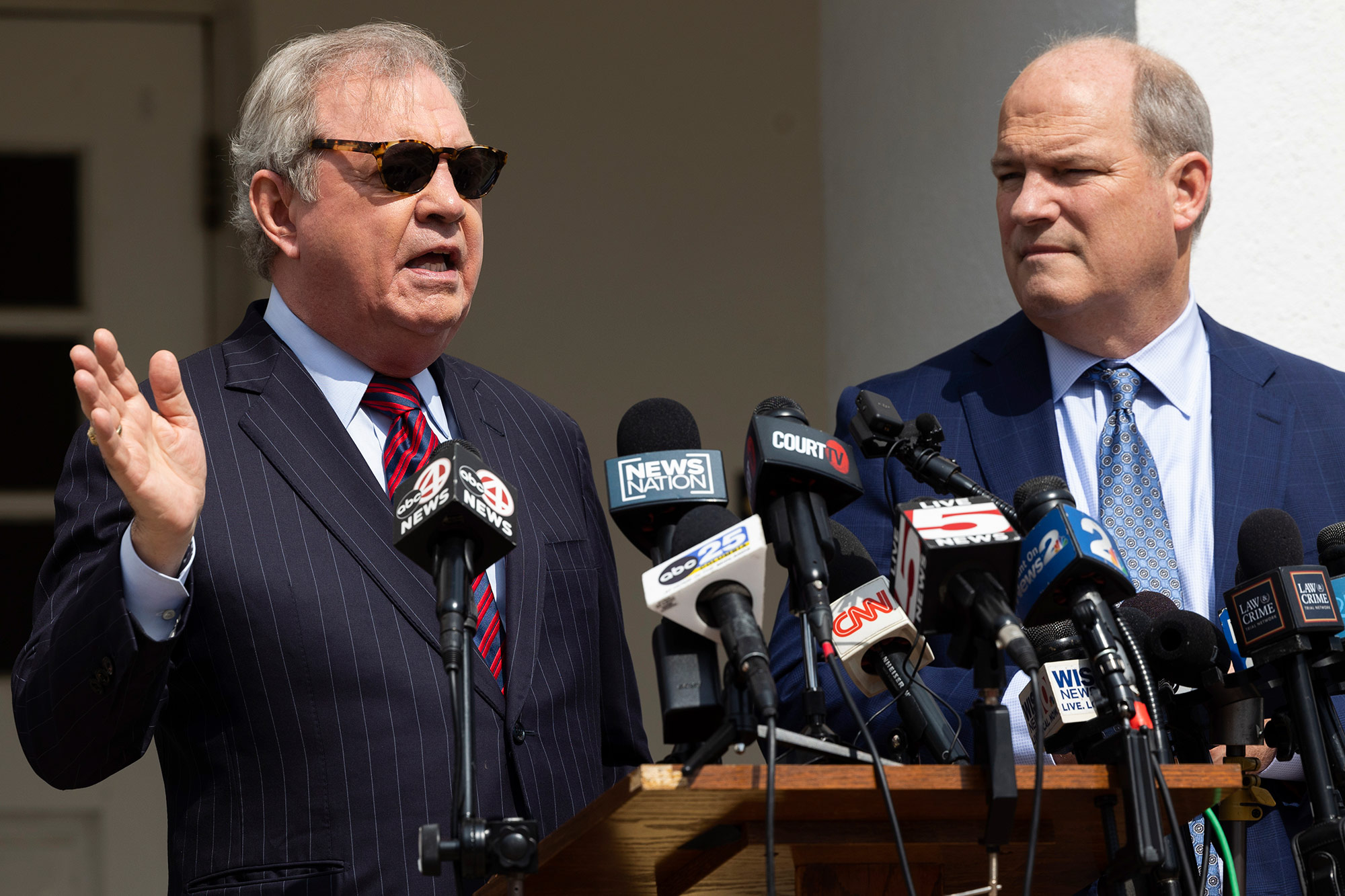 Defense attorney Dick Harpootlian, left, speaks to press outside the Colleton County Courthouse on Friday, March 3.