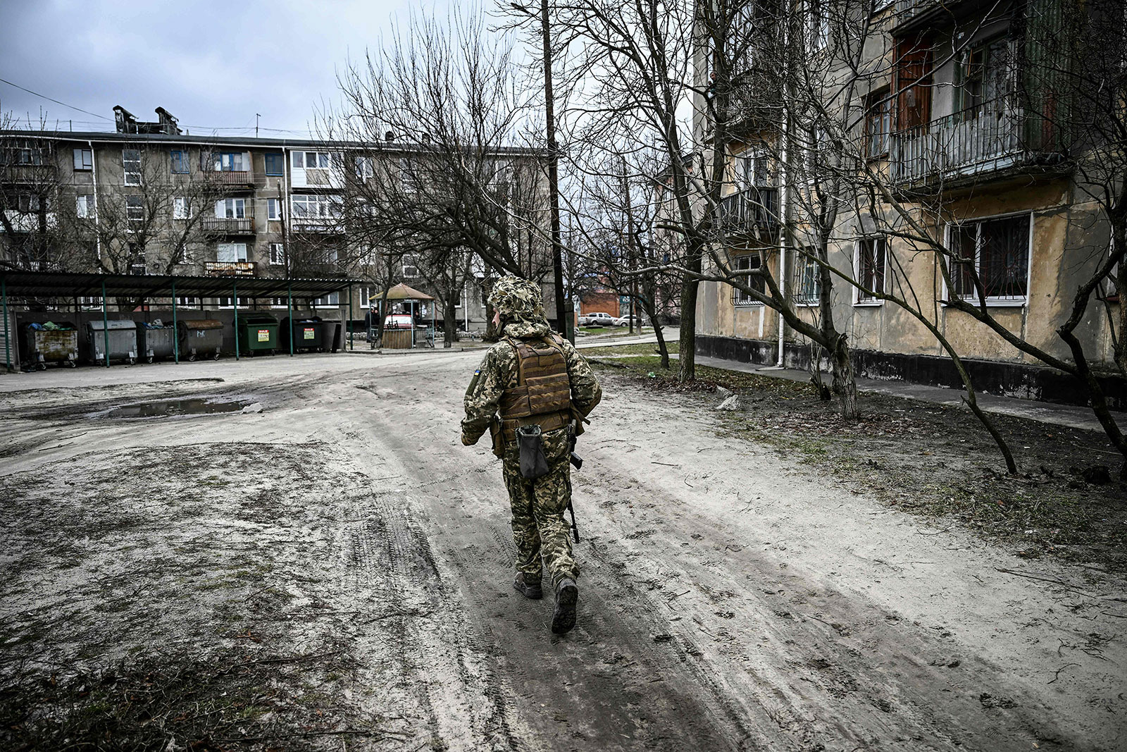 A Ukrainian soldier walks in the town of Schastia, near the eastern Ukrainian city of Luhansk, on February 22.
