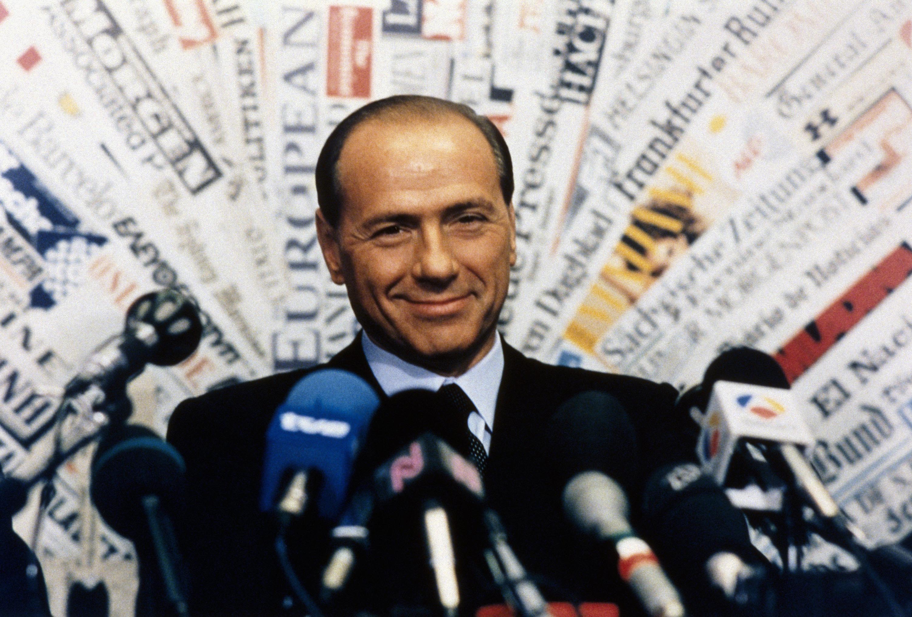 Silvio Berlusconi holds a press conference in Rome announcing his debut into politics in November 1993.