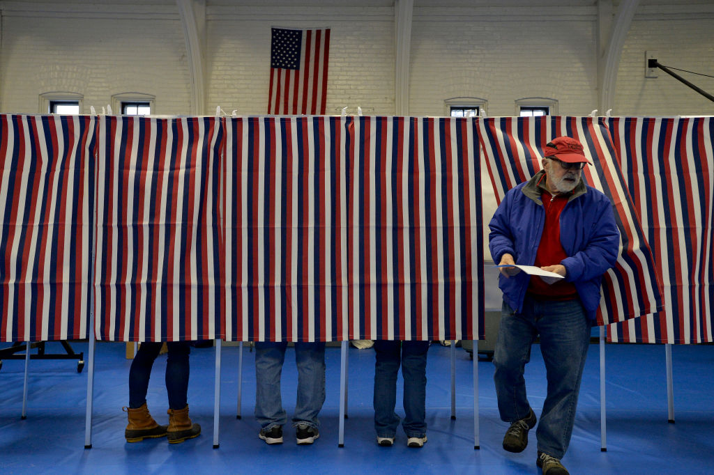 Voters cast their ballots at the Ward Five Community Center during the New Hampshire primary in Concord on Feb. 11, 2020. 