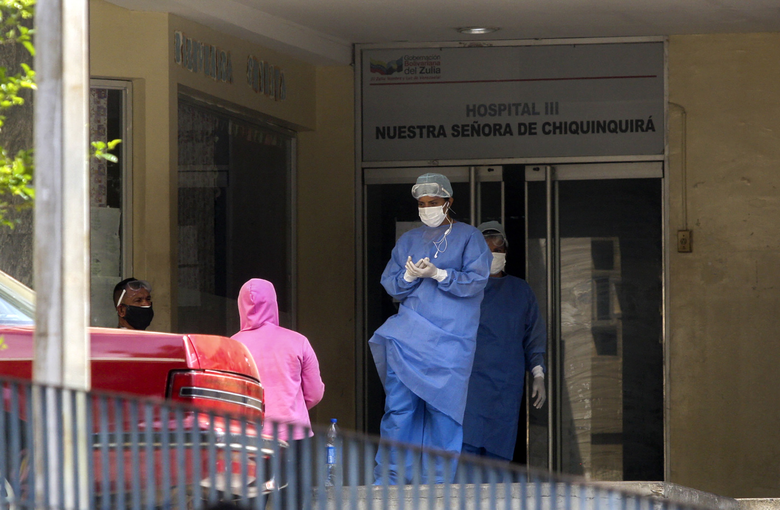 Medical personnel are seen outside the emergency room of the University Hospital in Maracaibo, in Venezuela, on July 2, amid the Covid-19 pandemic.  