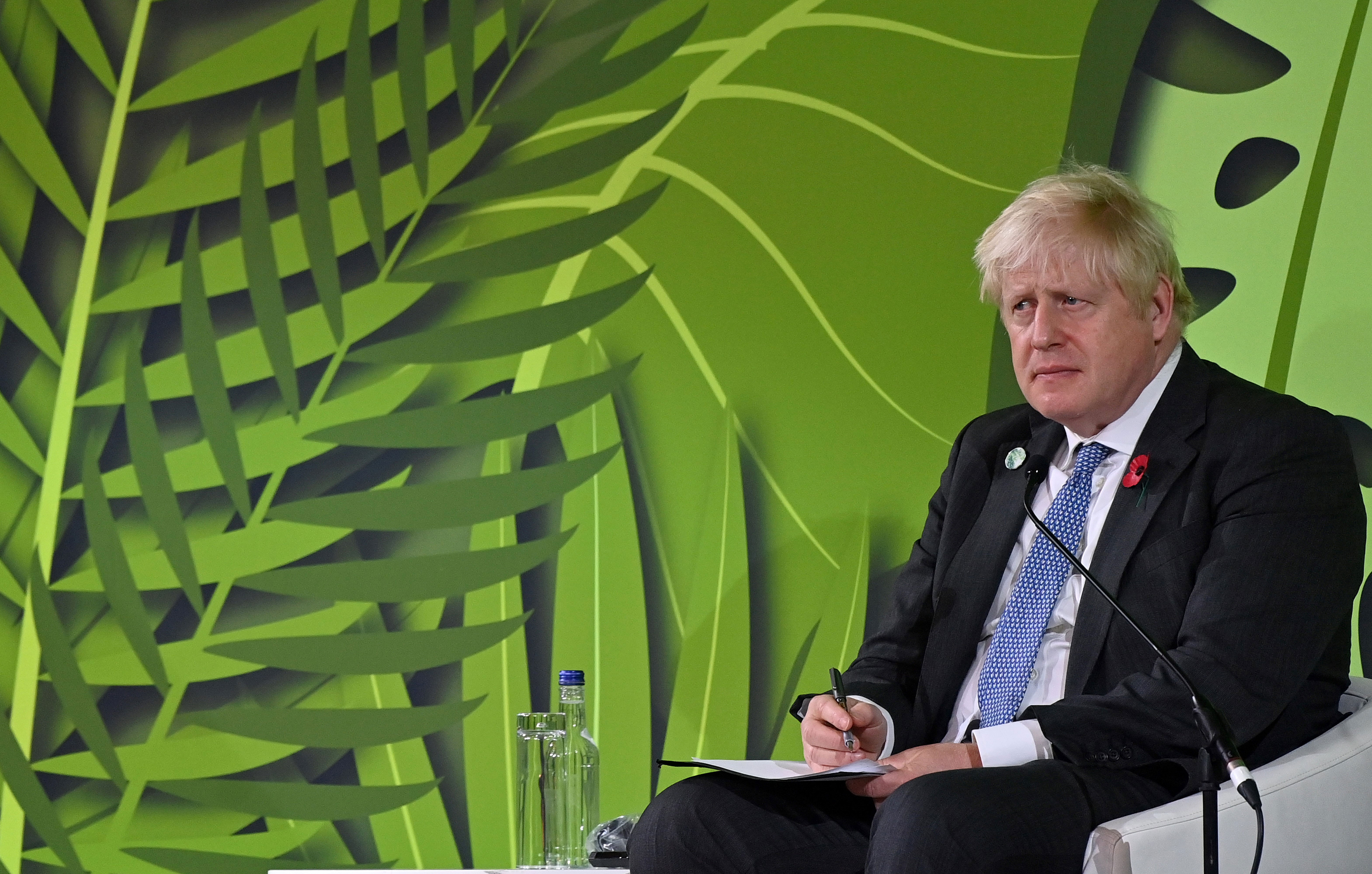British Prime Minister Boris Johnson listens during an event at COP26 in Glasgow, Scotland, on November 2.