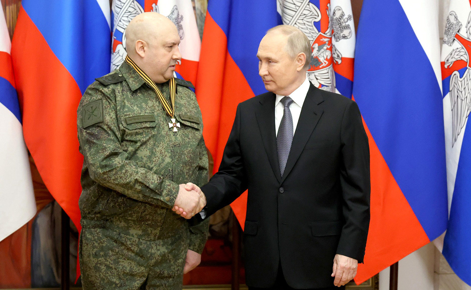 russian soldier war hero with a flag against the