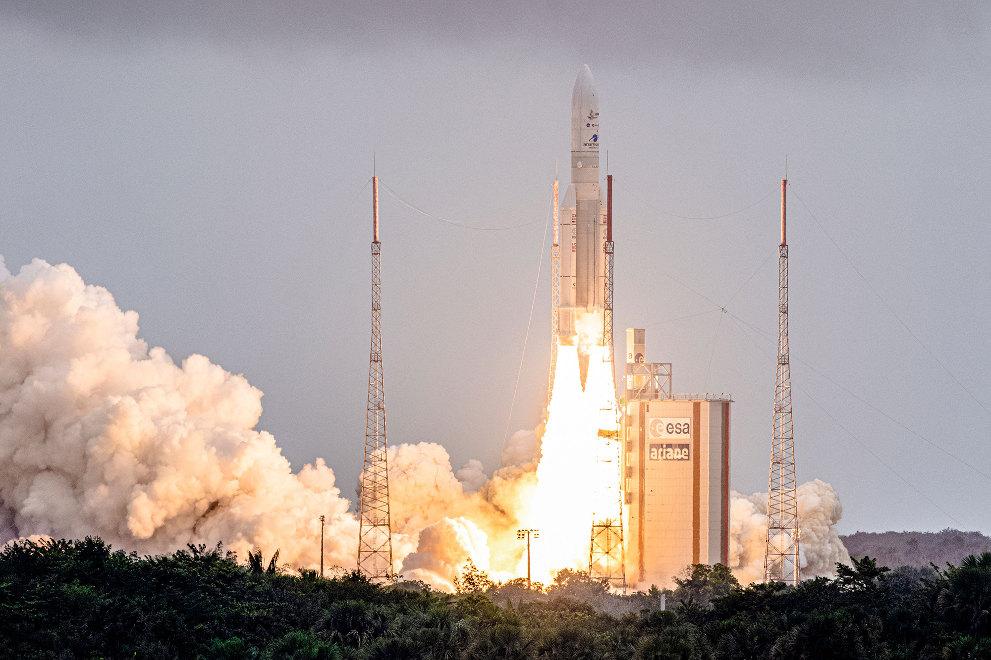 Arianespace's Ariane 5 rocket with NASAs James Webb Space Telescope onboard lifts up from the launchpad, at the Europes Spaceport, the Guiana Space Center in Kourou, French Guiana, on December 25, 2021. 