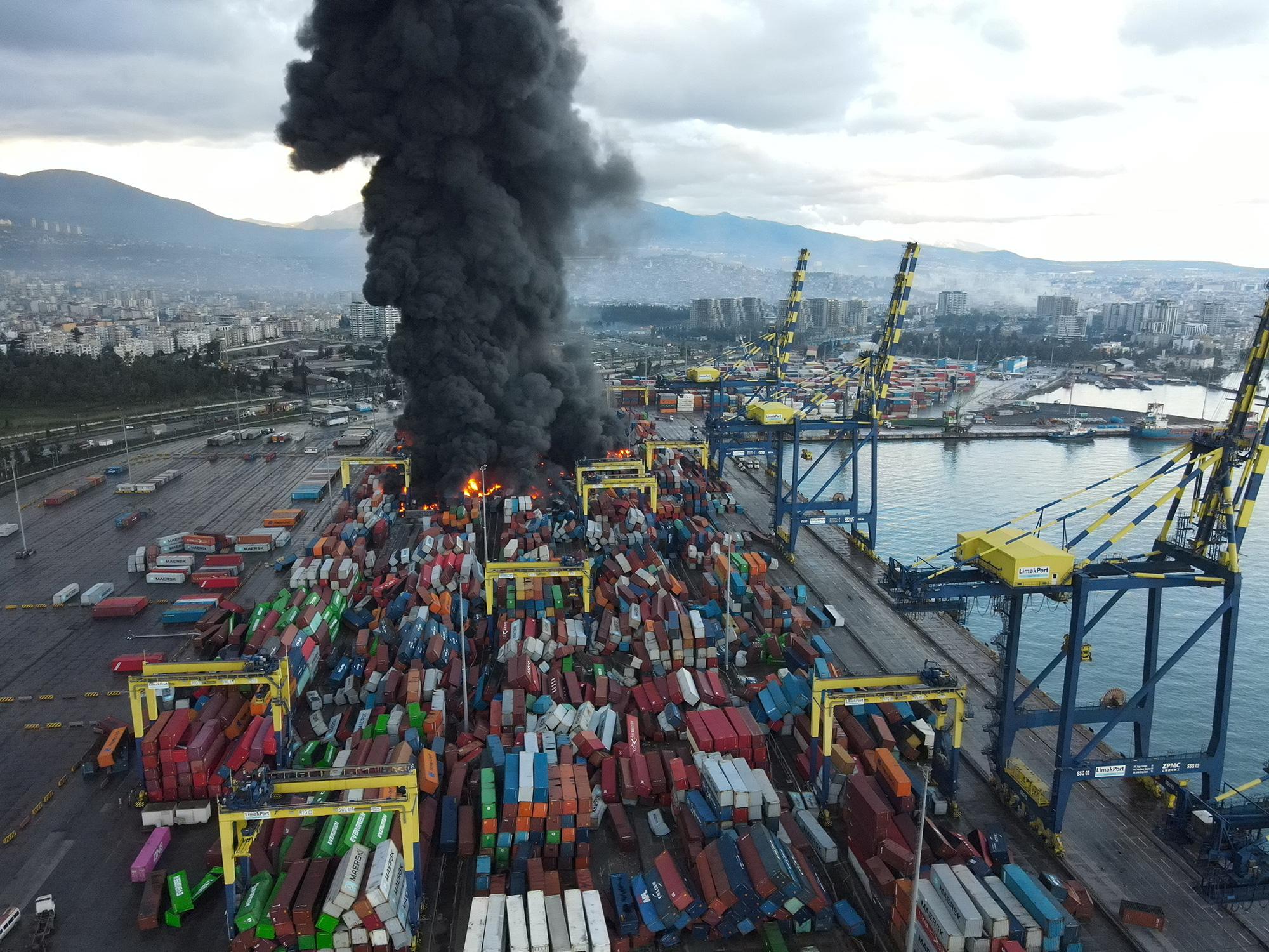Black smoke rises from a fire at the Iskenderun port in Iskenderun, Turkey.