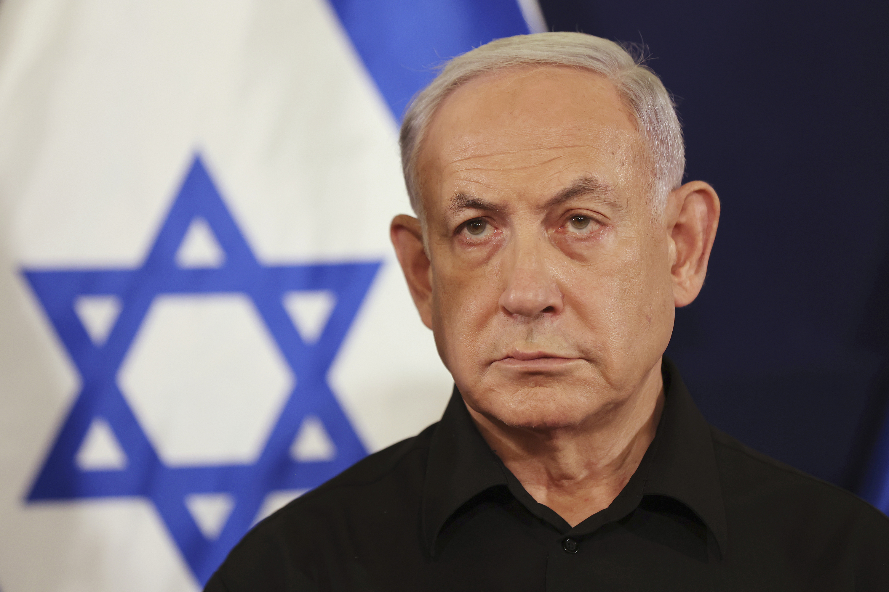 Israeli Prime Minister Benjamin Netanyahu attends a press conference with Defense Minister Yoav Gallant and Cabinet Minister Benny Gantz in the Kirya military base in Tel Aviv, Israel, on October 28, 2023.
