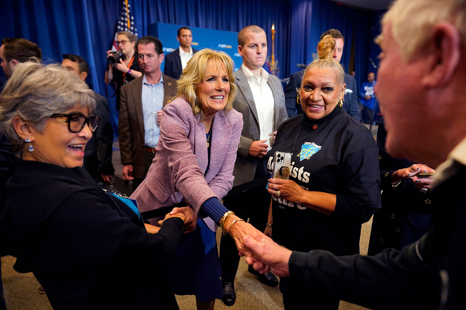 First lady Jill Biden shakes hands as she departs a Get Out the Vote rally during a visit to the American Federation of Teacher's headquarters in Pittsburgh on November 2. 