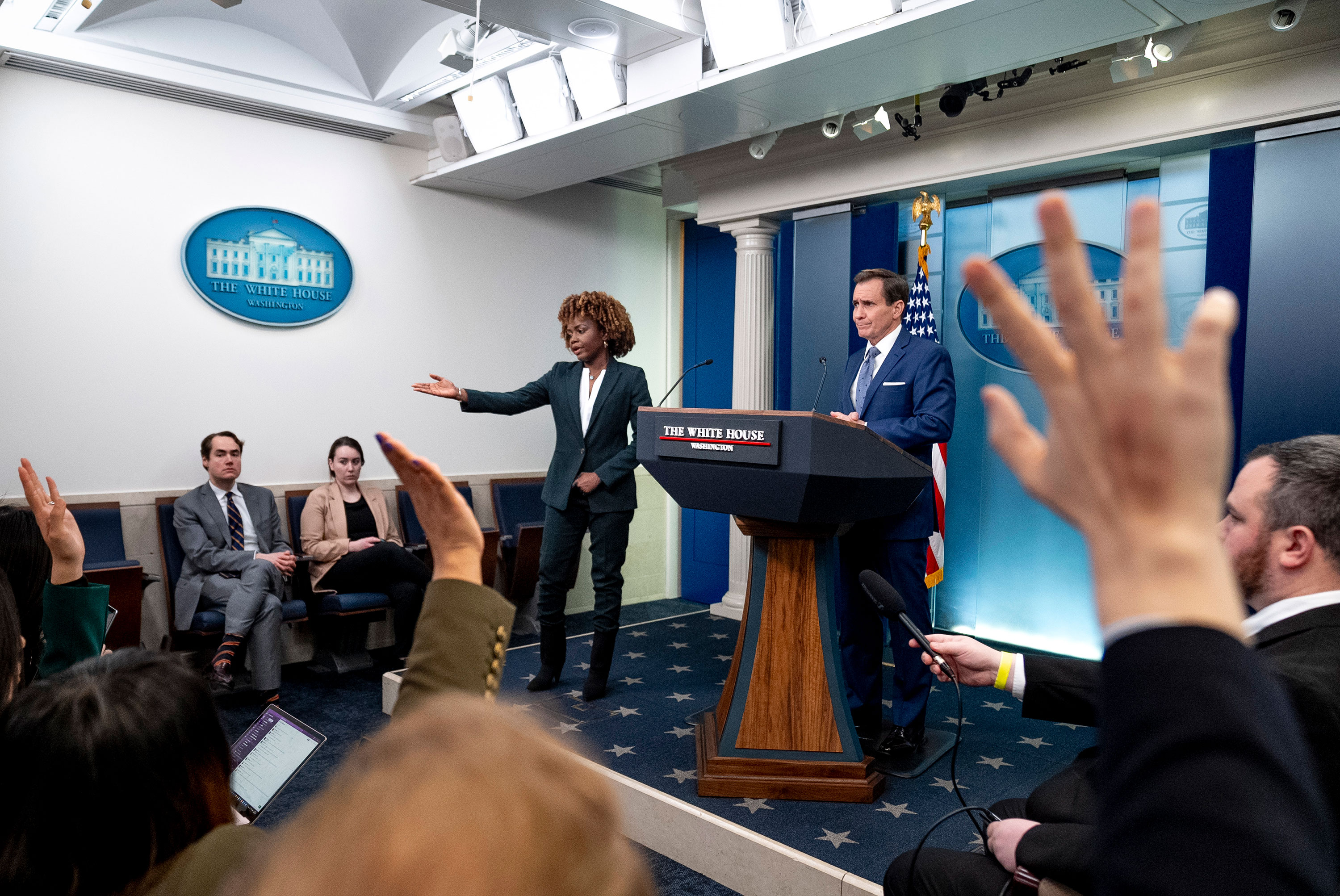 White House press secretary Karine Jean-Pierre, center, takes a question from a reporter for National Security Council spokesperson John Kirby, right, during a press briefing at the White House in Washington, DC, on March 1. 
