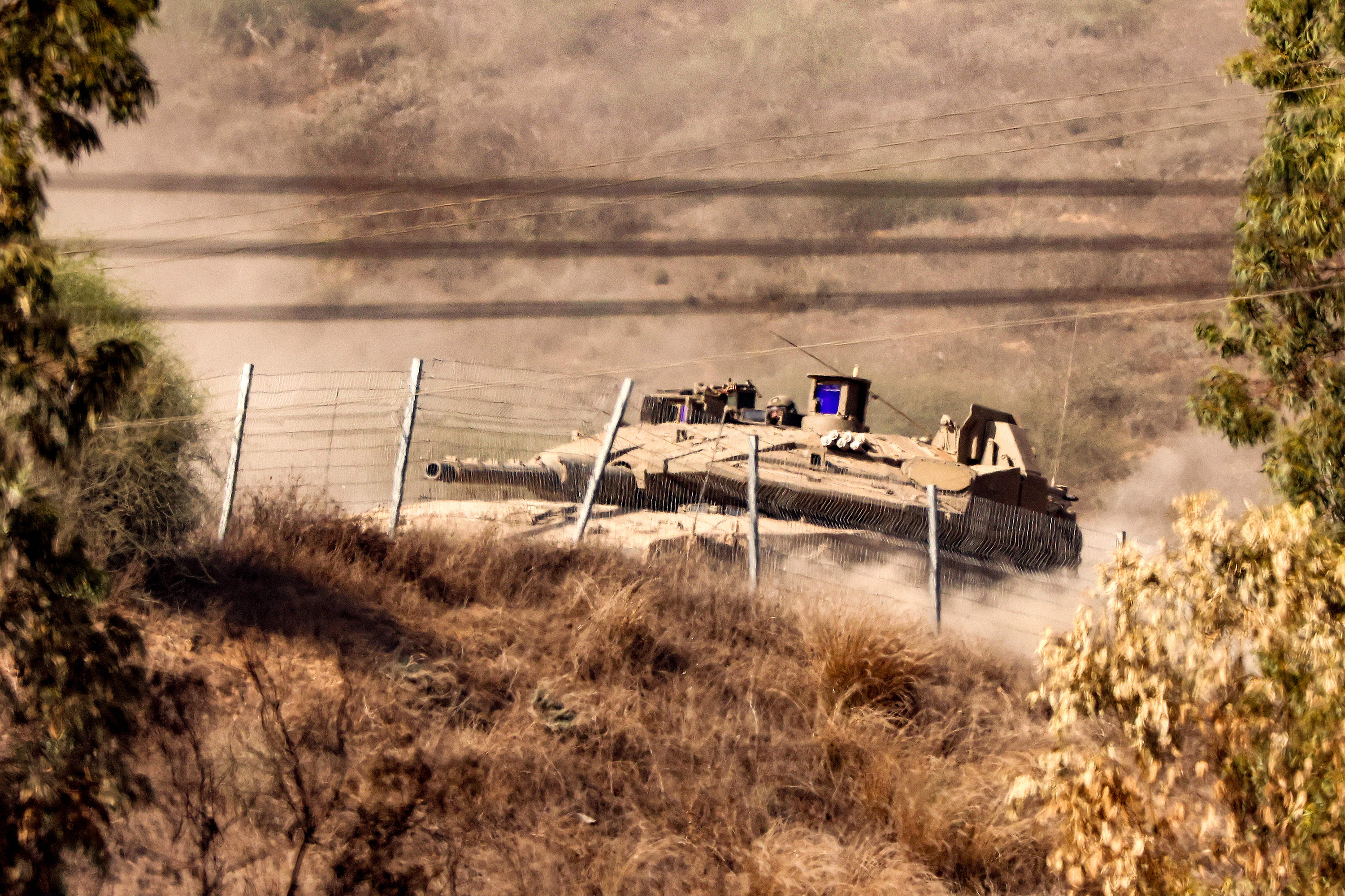 An Israeli army tank moves to a position near the border with Gaza in southern Israel on November 3.