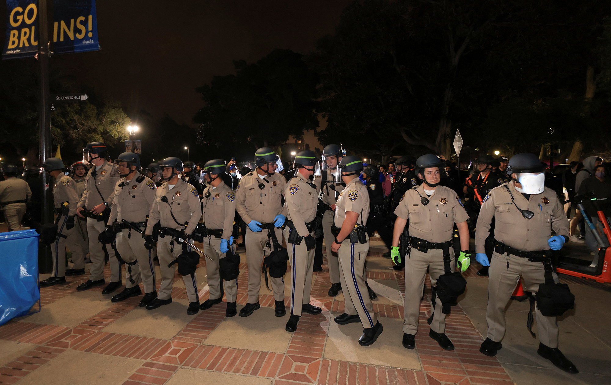 California Highway Patrol officers line up as counter-protesters clash with protesters in support of Palestinians in Gaza at an encampment on the campus of the University of California, Los Angeles (UCLA) on May 1.