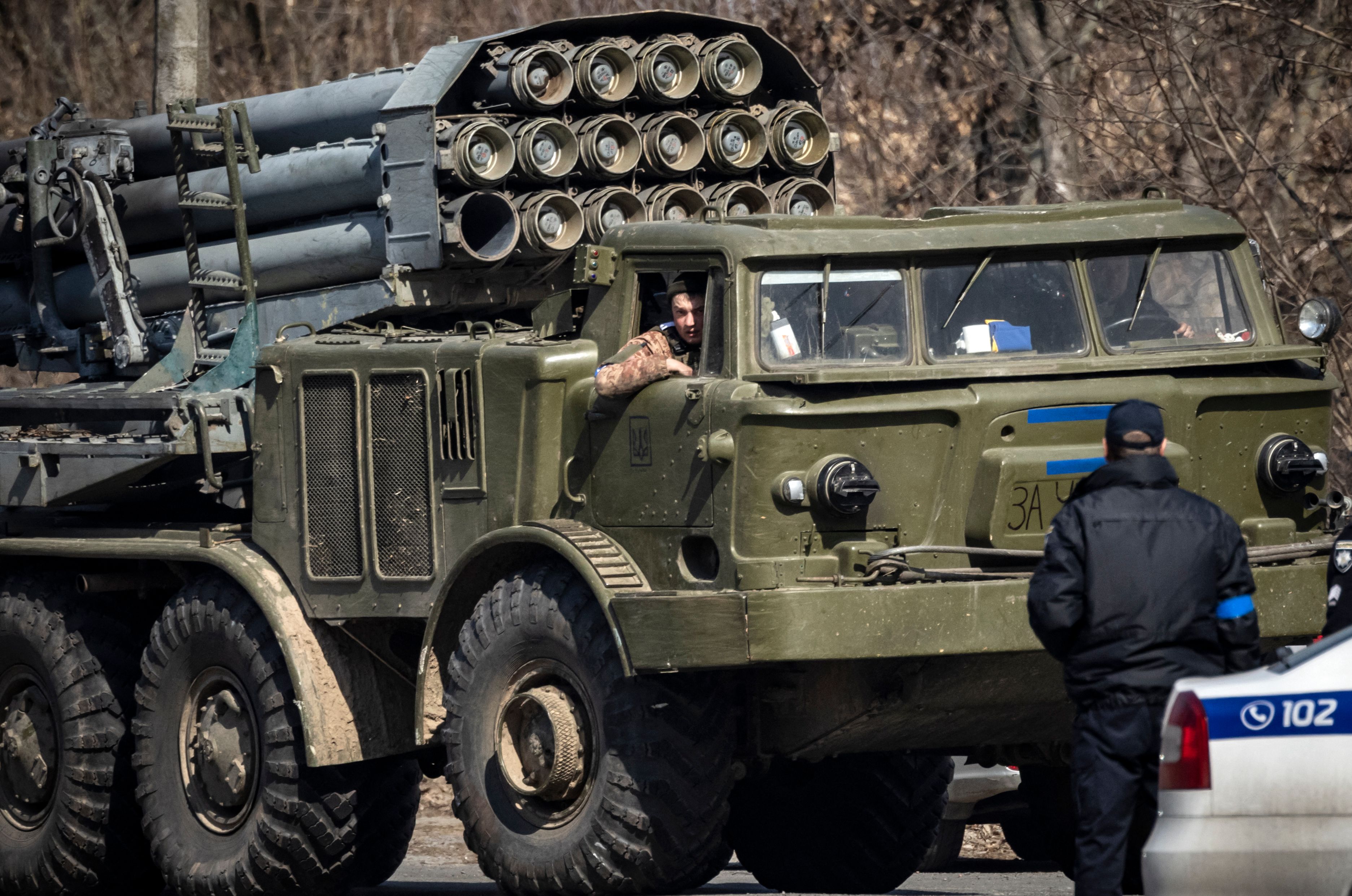 A Ukrainian military vehicle is seen on the road in Kyiv, Ukraine, on March 24.