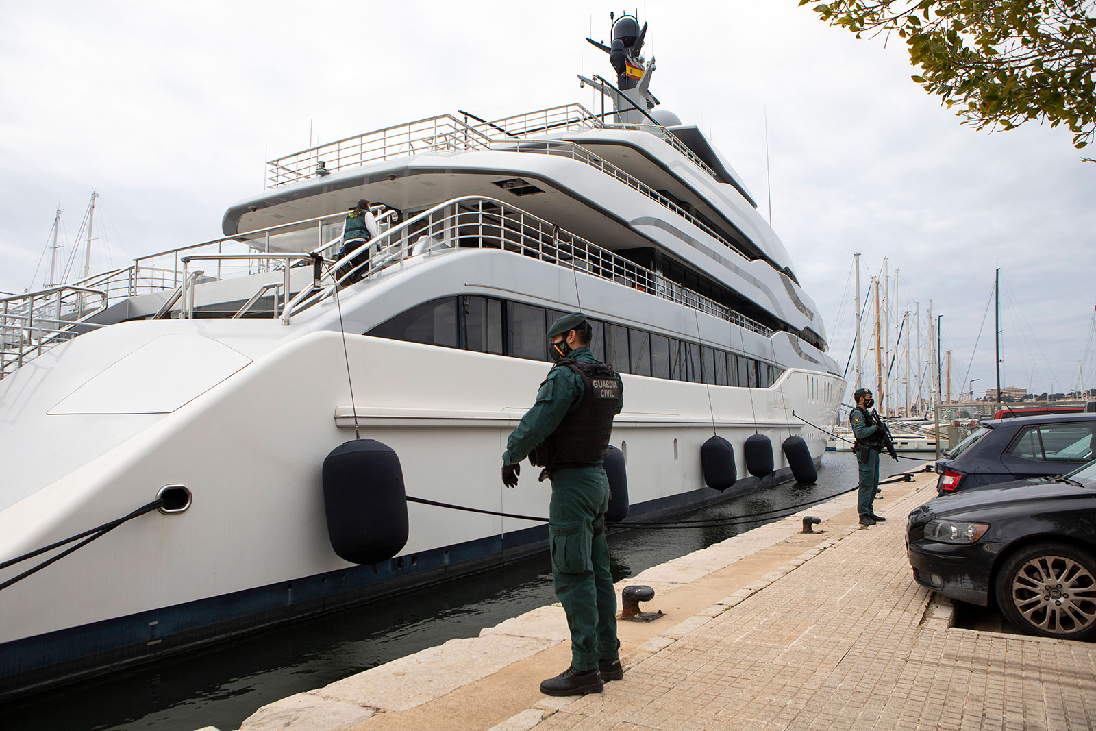 Civil Guards stand by the yacht called Tango in Palma de Mallorca, Spain, on April 4, 2022.