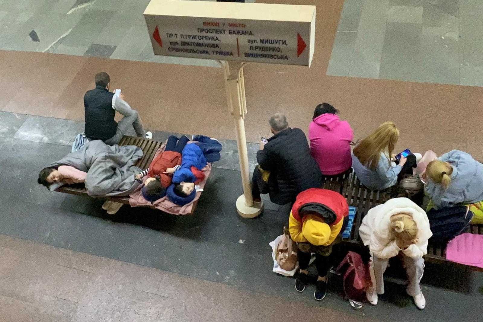 This screen grab shows people taking shelter in a subway station in Kyiv, Ukraine, on June 2.