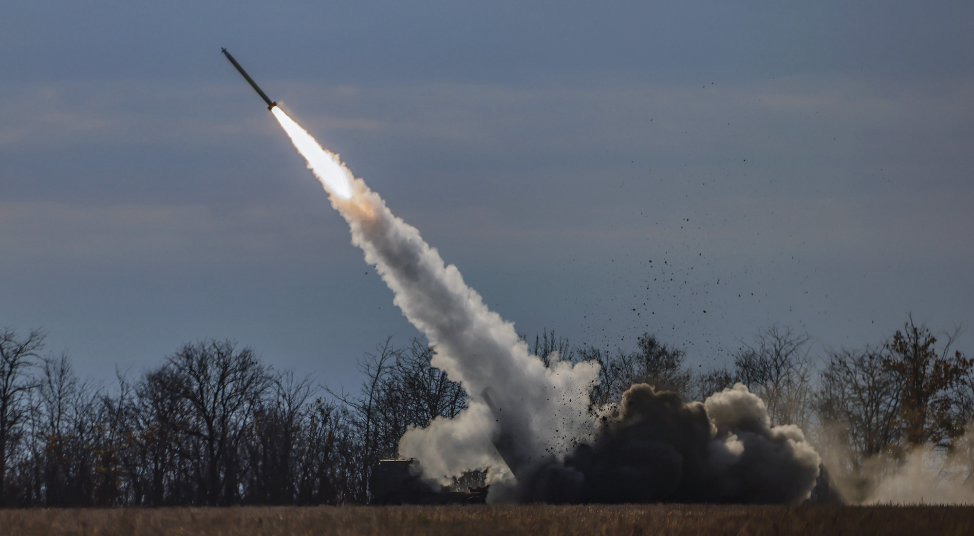 A High Mobility Artillery Rocket System (HIMARS) of the Ukrainian army fires close to the frontline in the northern Kherson region on November 5, 2022.