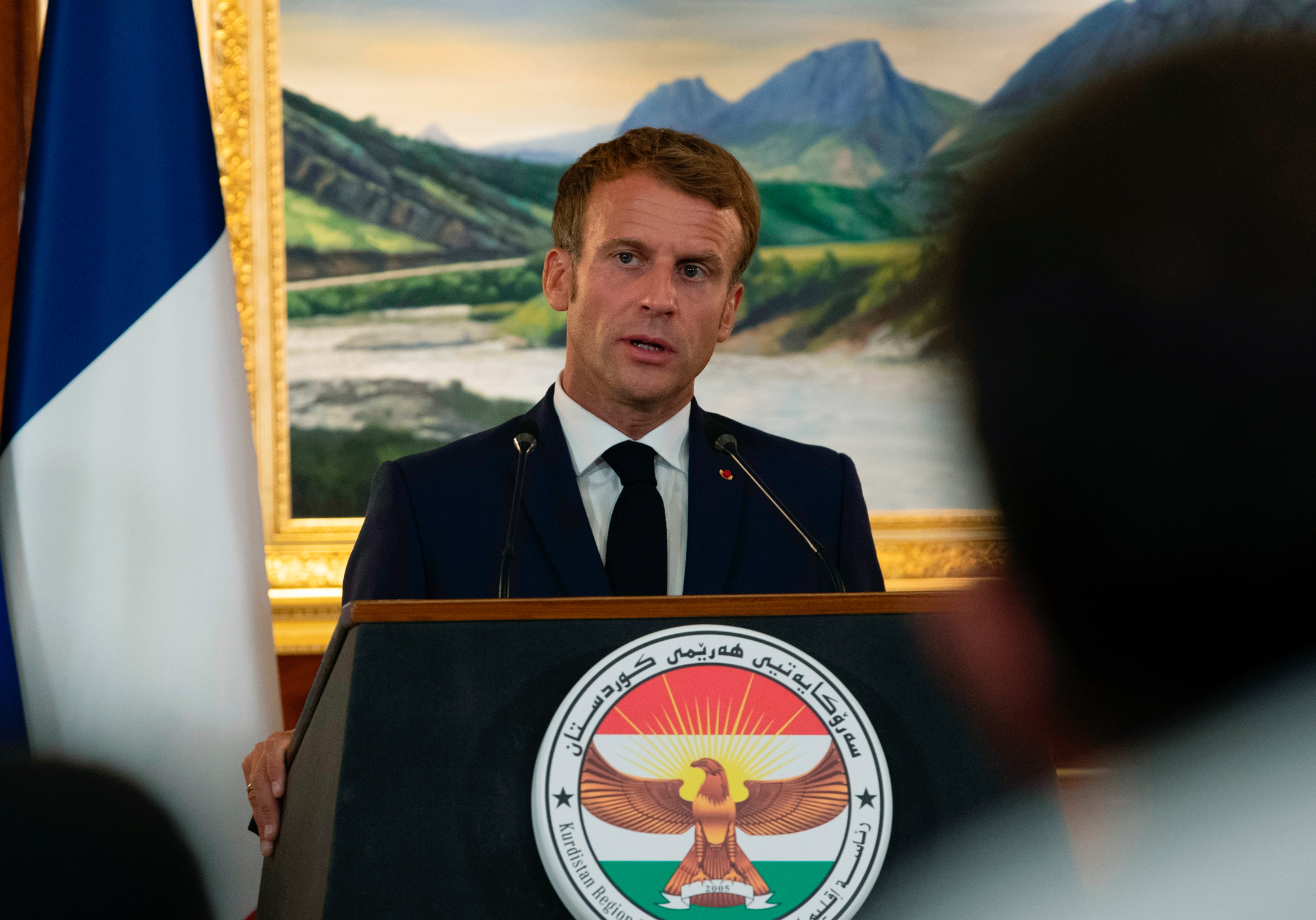 French President Emmanuel Macron speaks at a press conference following his meeting with Kurdish President Nechirvan Barzani in Irbil, Iraq, on Sunday, August 29.