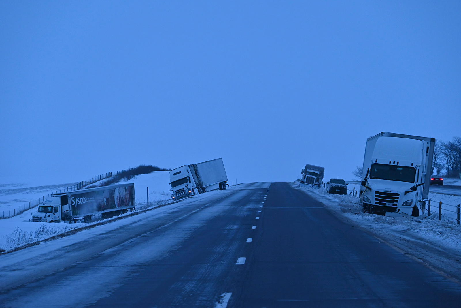 Vehicle are seen after a collision on Interstate 80 in Newton, Iowa, on Wednesday.