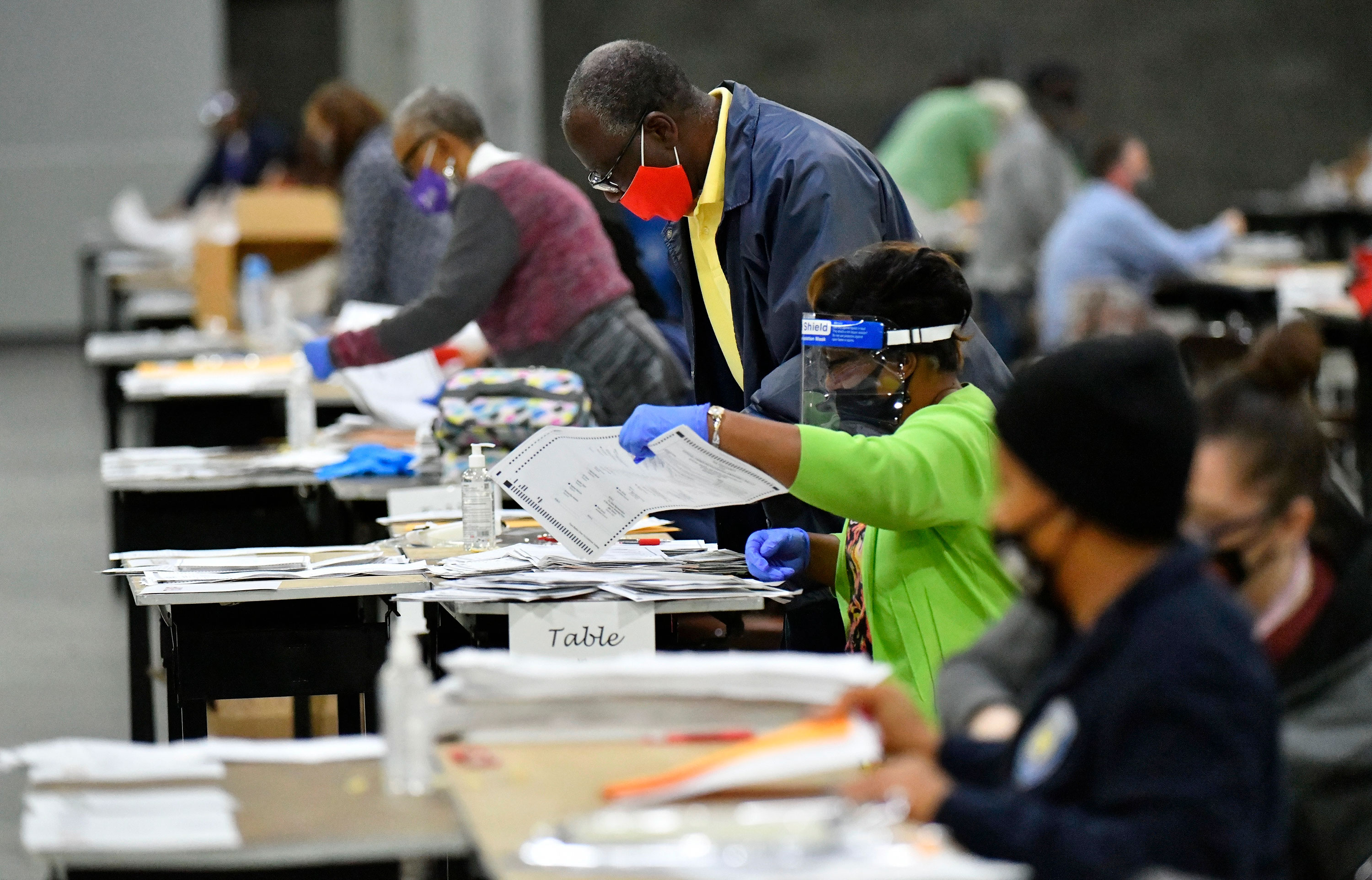 Election workers in Fulton County process ballots as part of the hand recount on November 14 in Atlanta.