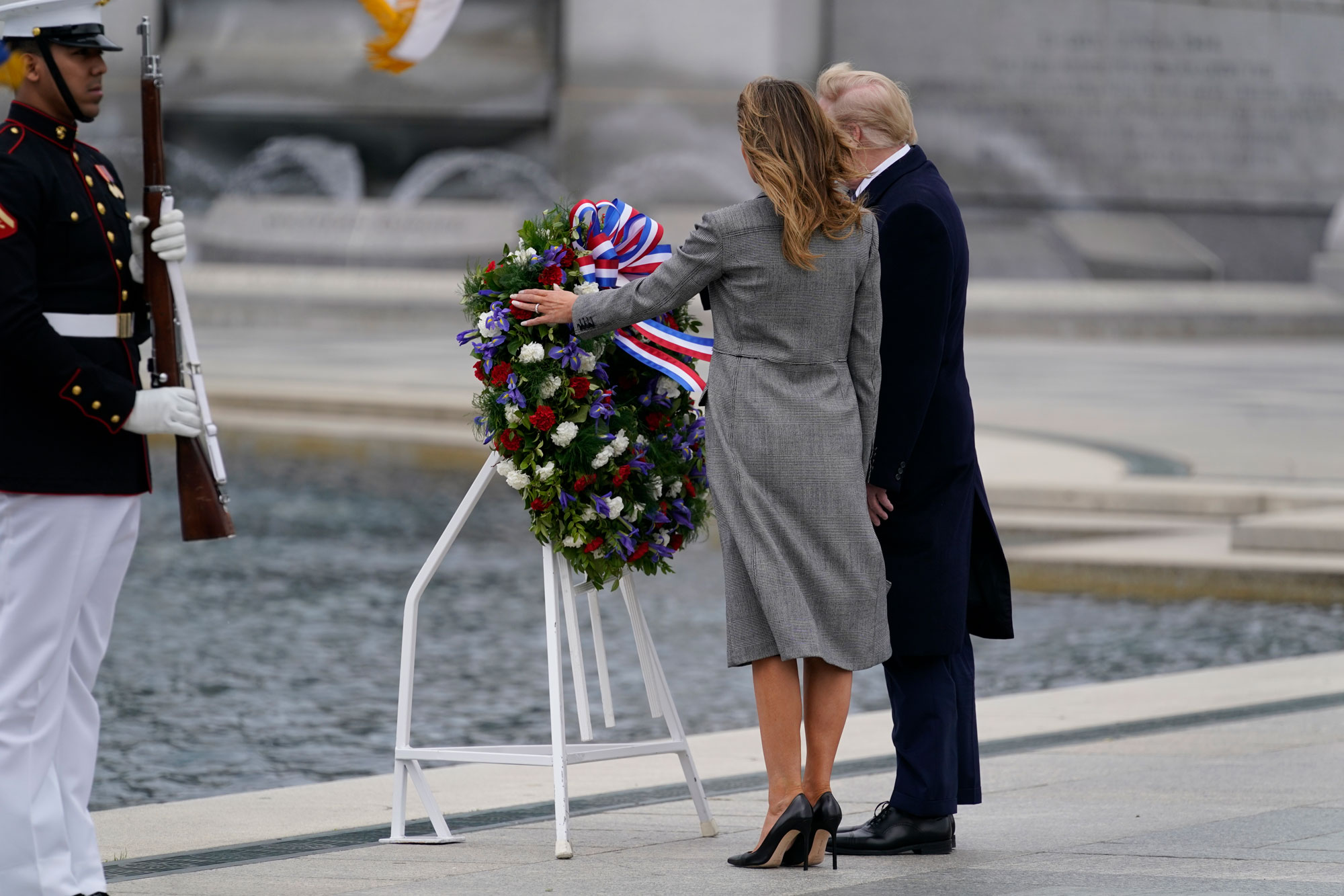 President Donald Trump and first lady Melania Trump participate in a wreath laying ceremony at the World War II Memorial to commemorate the 75th anniversary of Victory in Europe Day, on May 8, in Washington. 