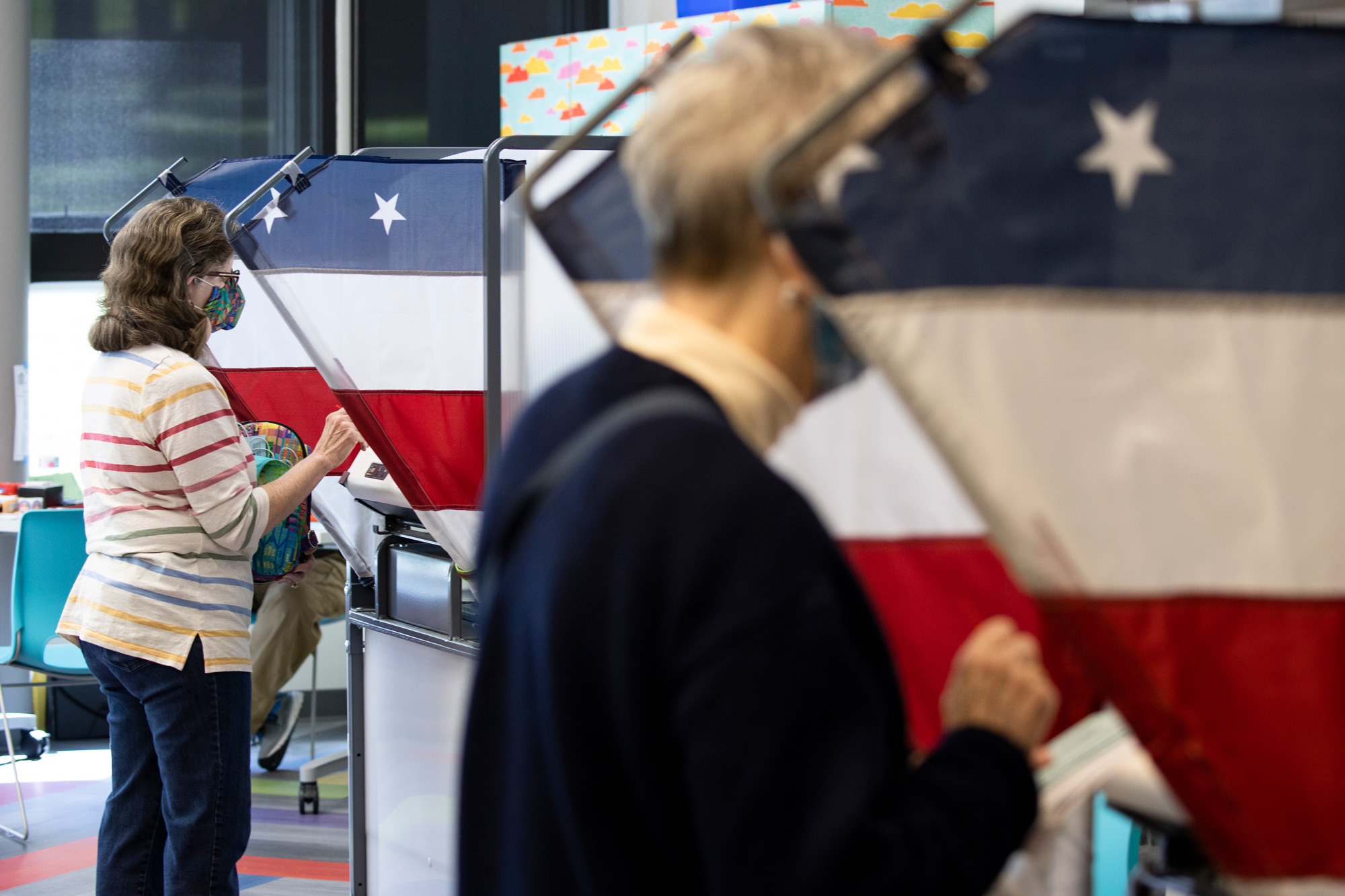 Voters cast their ballots during early voting at a Nashville Public Library building on October 14 in Nashville, Tennessee. 