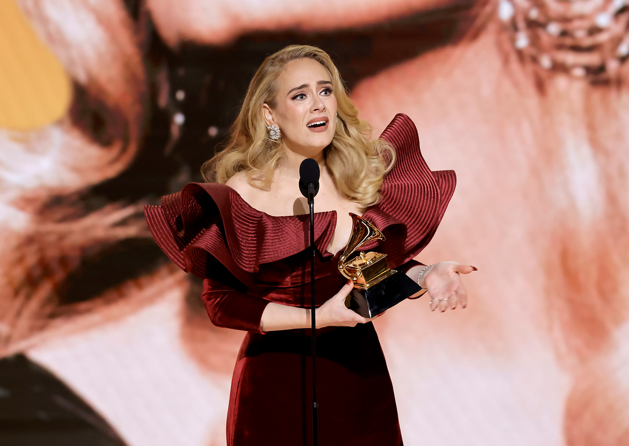 Adele accepts the Best Pop Solo Performance award for “Easy On Me."