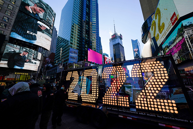 The 2022 sign that will be lit on top of a building on New Year's Eve is displayed in Times Square, New York, on Monday, Dec. 20.