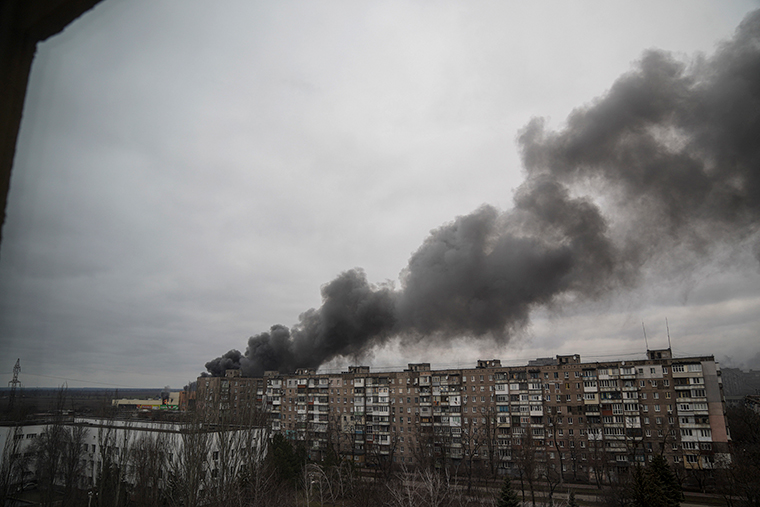 Smoke rises after apparent shelling by Russian forces in Mariupol, Ukraine, Friday, March 4.