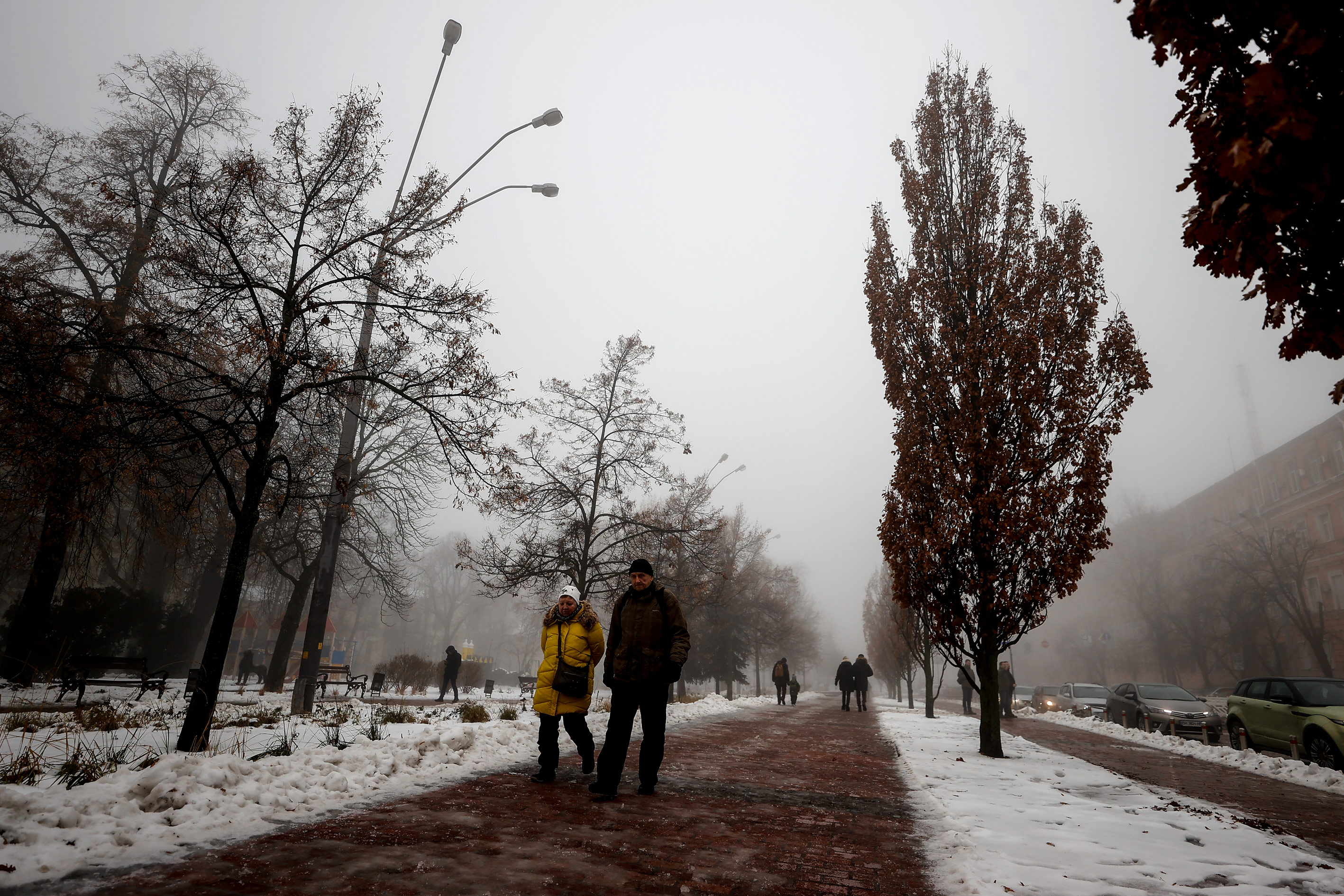 People walk in Kyiv, Ukraine, on December 17. 