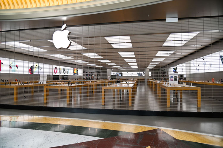 A closed Apple Store is pictured in a deserted shopping mall in Rome, Italy, on March 12.