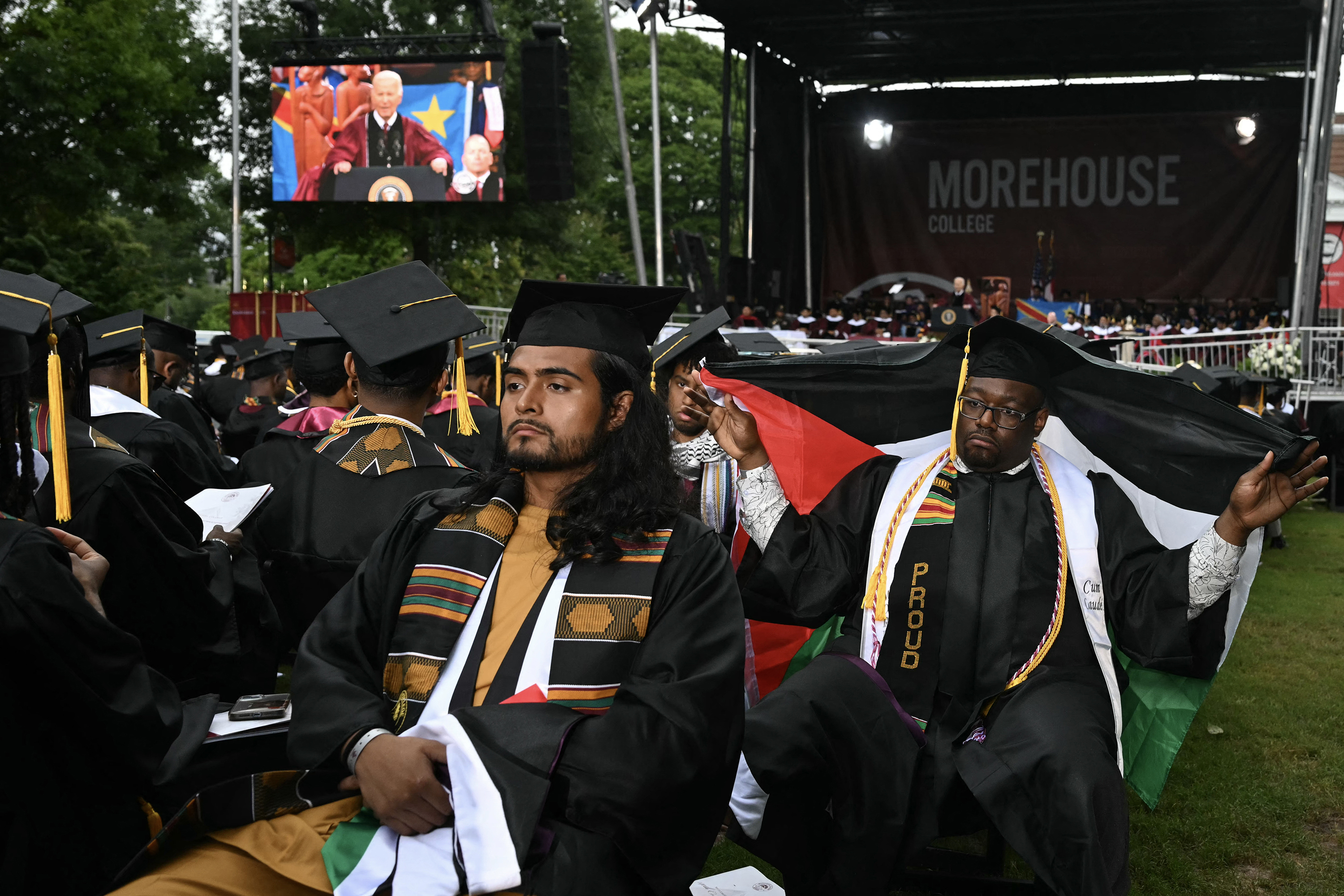 Graduating students turn their backs on President Joe Biden as he delivers a commencement address at Morehouse College in Atlanta on May 19.