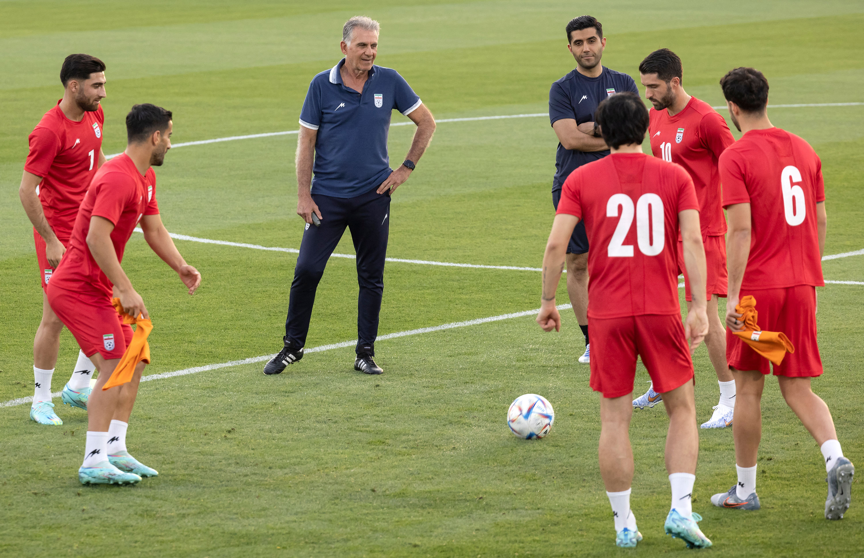 Carlos Queiroz (C) watches team Iran during a training session in Doha on November 17, ahead of the Qatar 2022 World Cup football tournament.