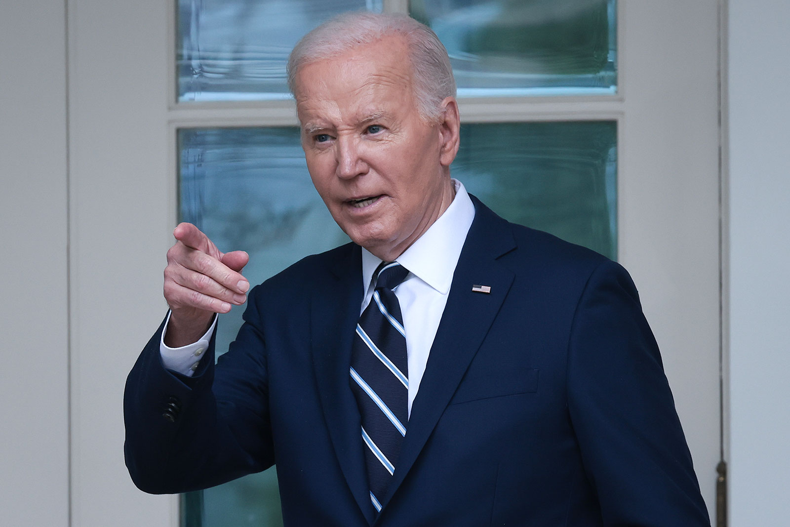 President Joe Biden returns to the Oval Office from the Rose Garden on Tuesday, May 14.