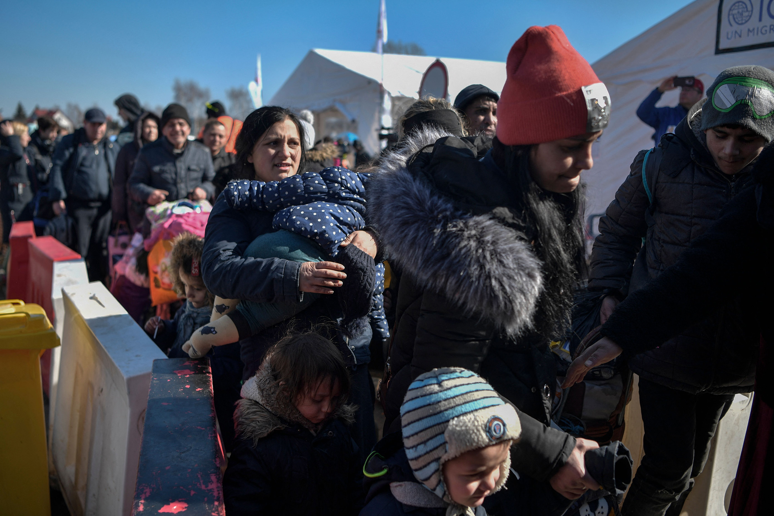 People cross the Ukrainian border in Medyka, eastern Poland, on March 11, 2022.