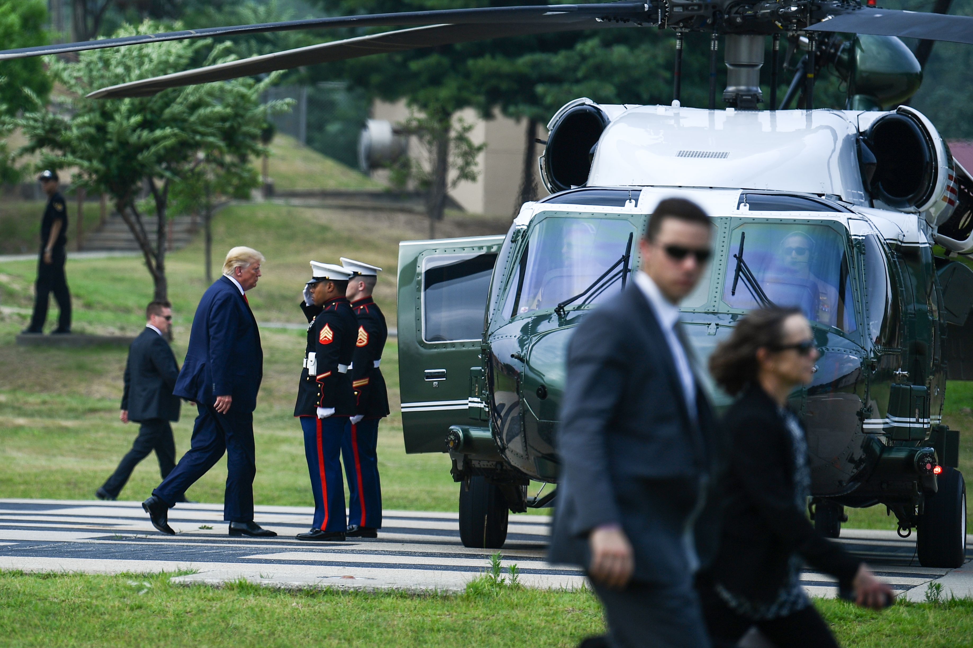 US President Donald Trump walking towards Marine One.