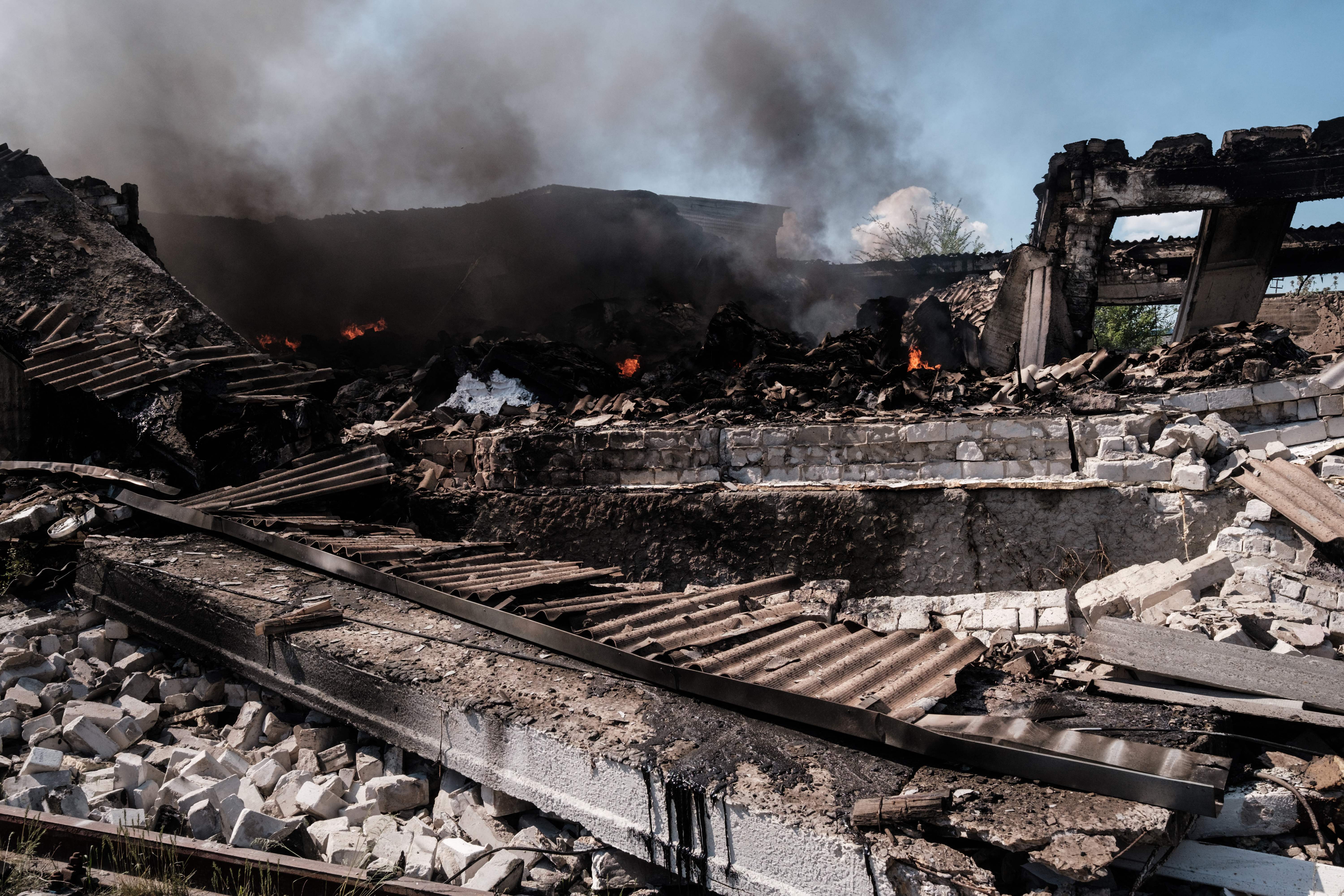 Smoke rises at a warehouse after shelling in Severodonetsk, eastern Ukraine, on May 3.