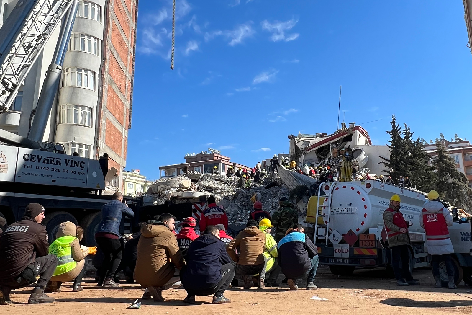 Members of a rescue team work near a collapsed building in Gaziantep, Turkey on February 9.