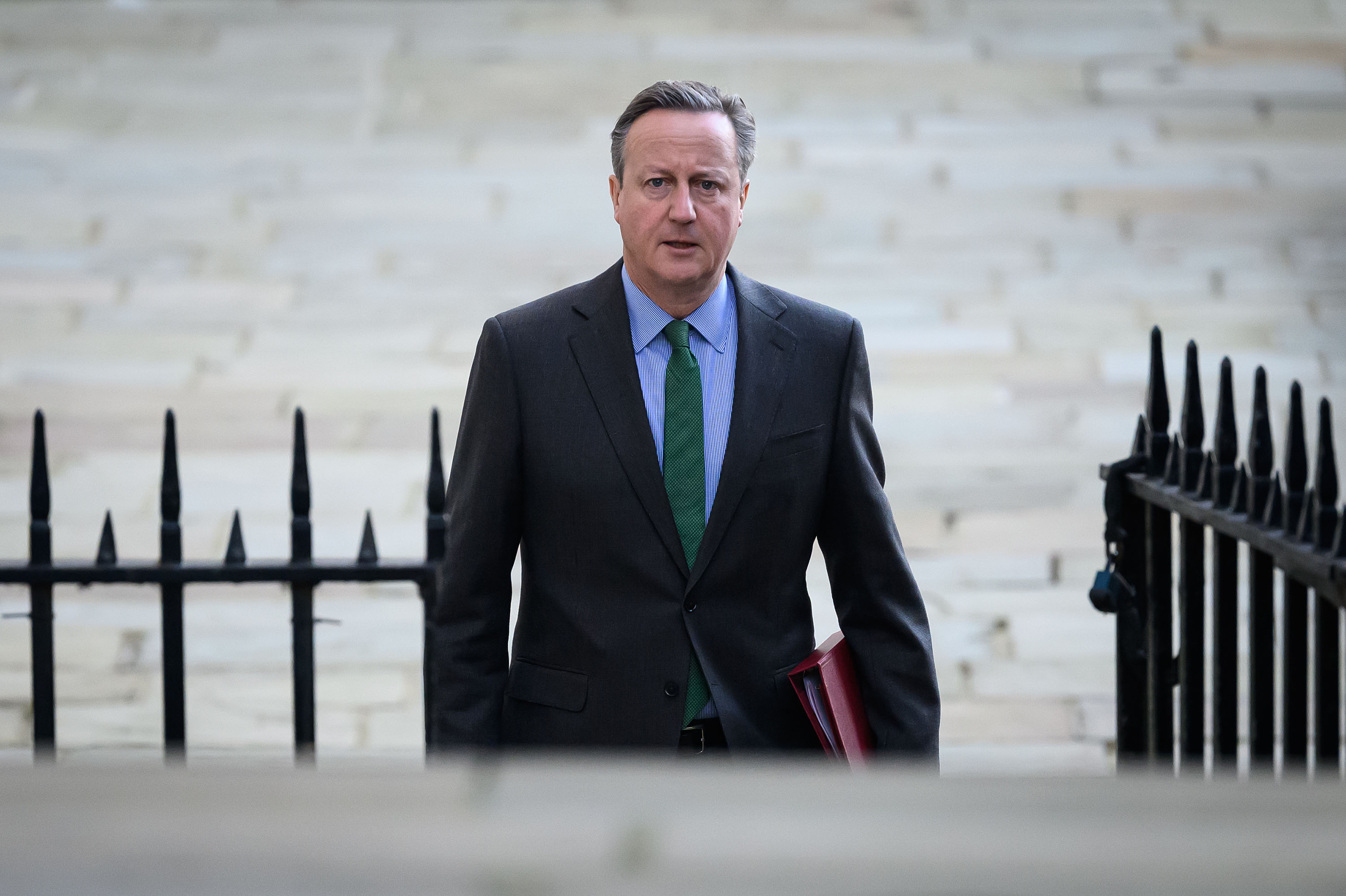 British Foreign Secretary David Cameron arrives at Downing Street in London on 16 January.