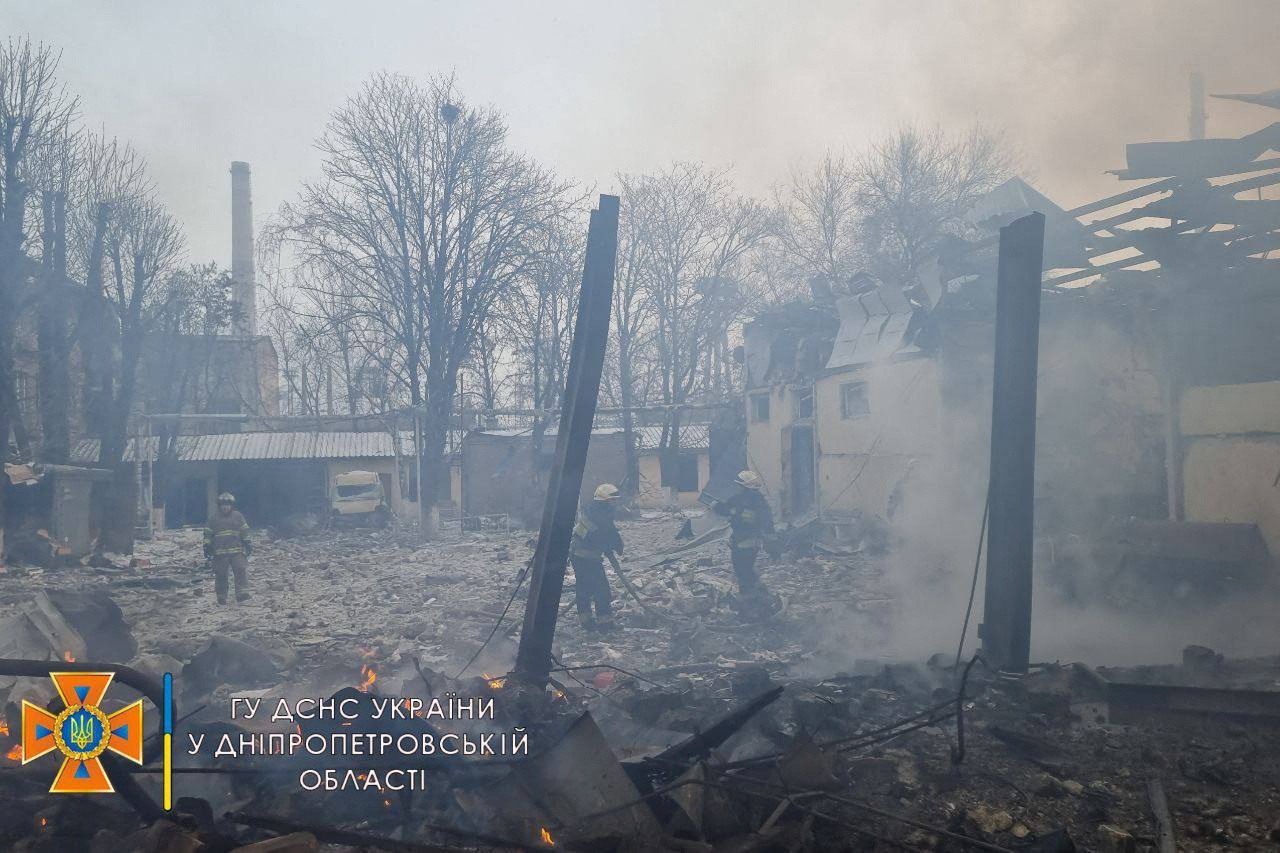 Rescuers sift through the remains of buildings damaged by an airstrike in Dnipro, Ukraine, in this handout picture released on March 11. 