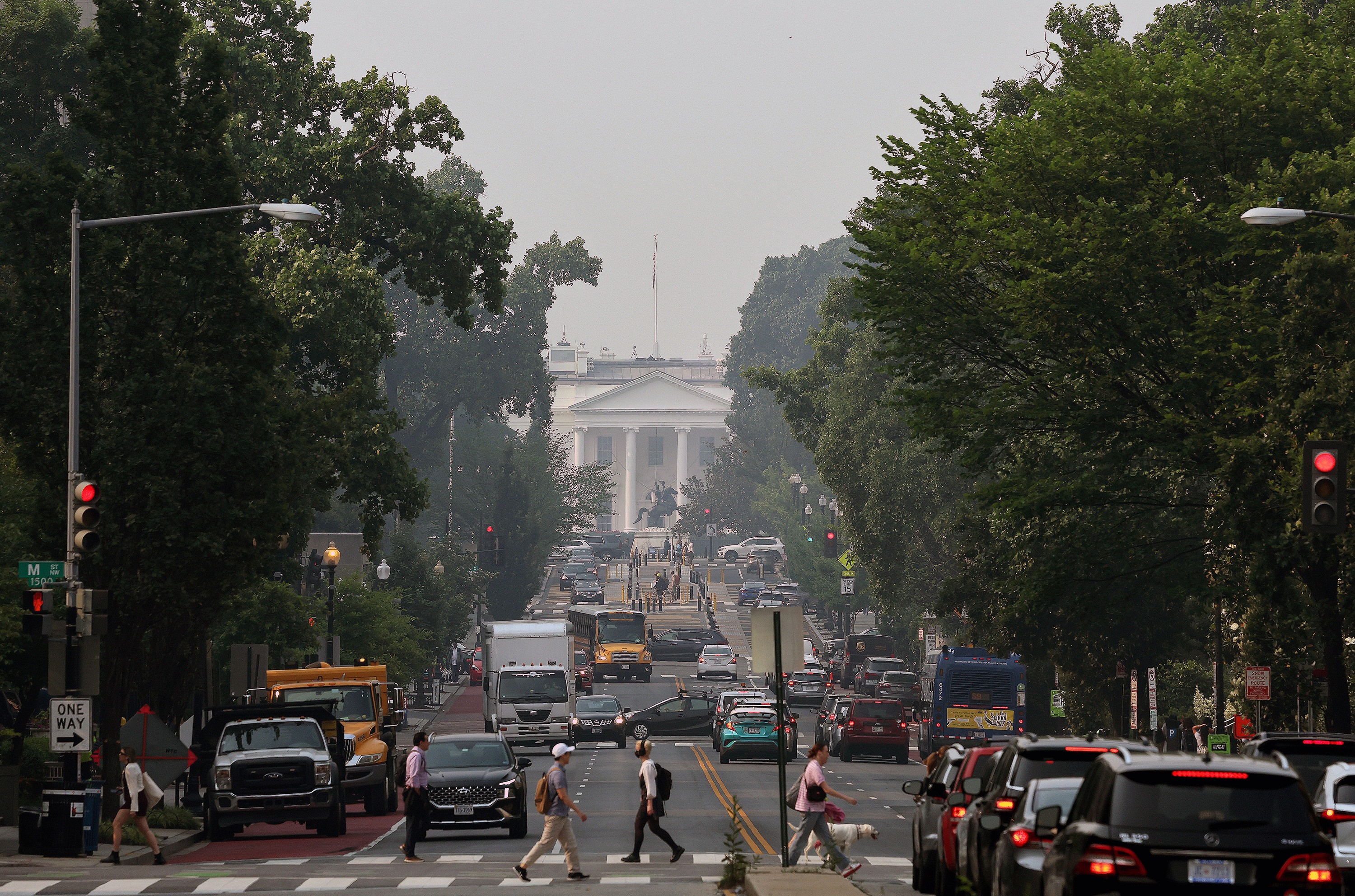The White House is seen through hazy skies caused by Canadian wildfires on June 7, in Washington, DC.