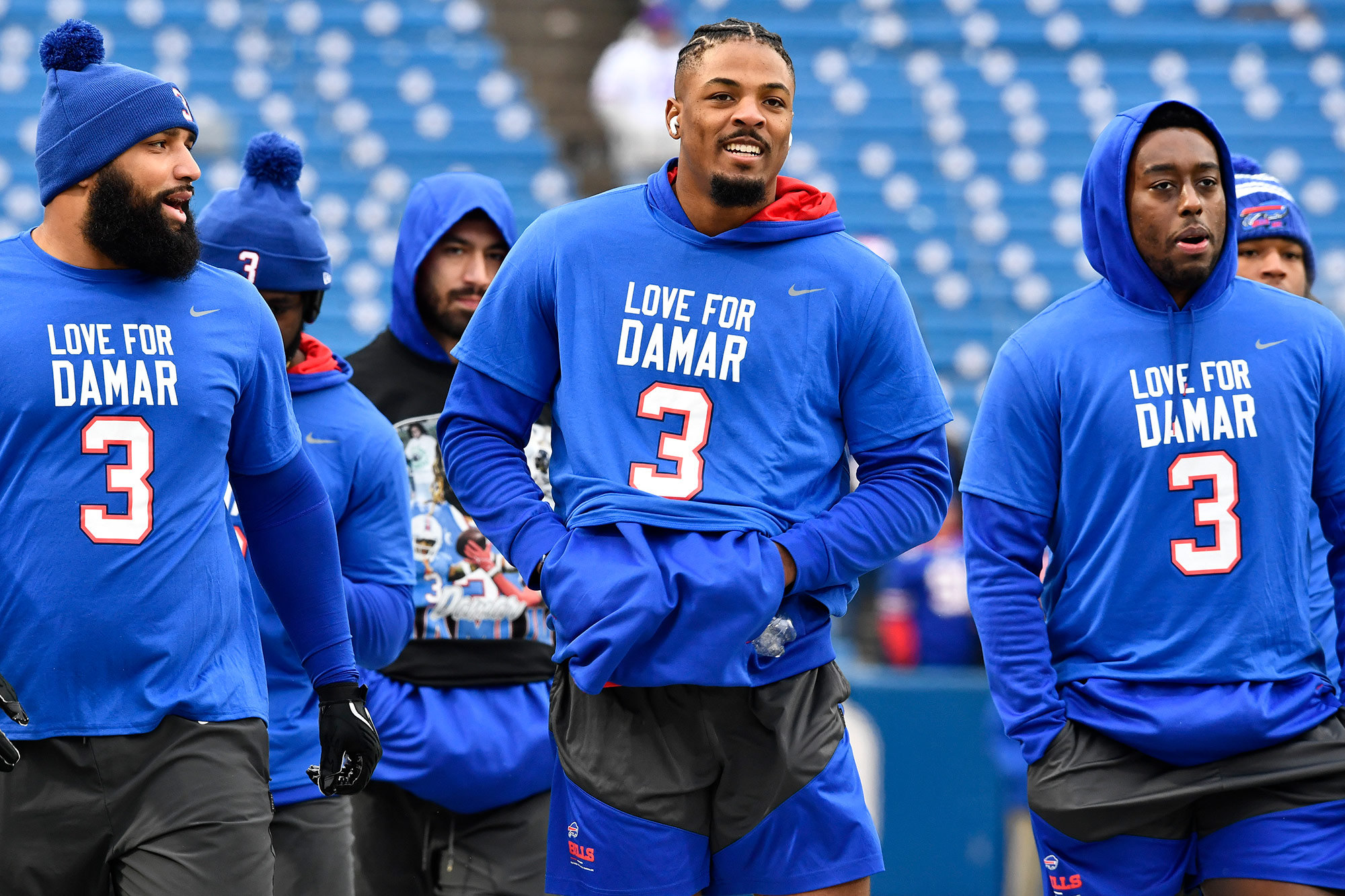 Buffalo Bills players wear the number 3 in support of safety Damar Hamlin on Sunday. 