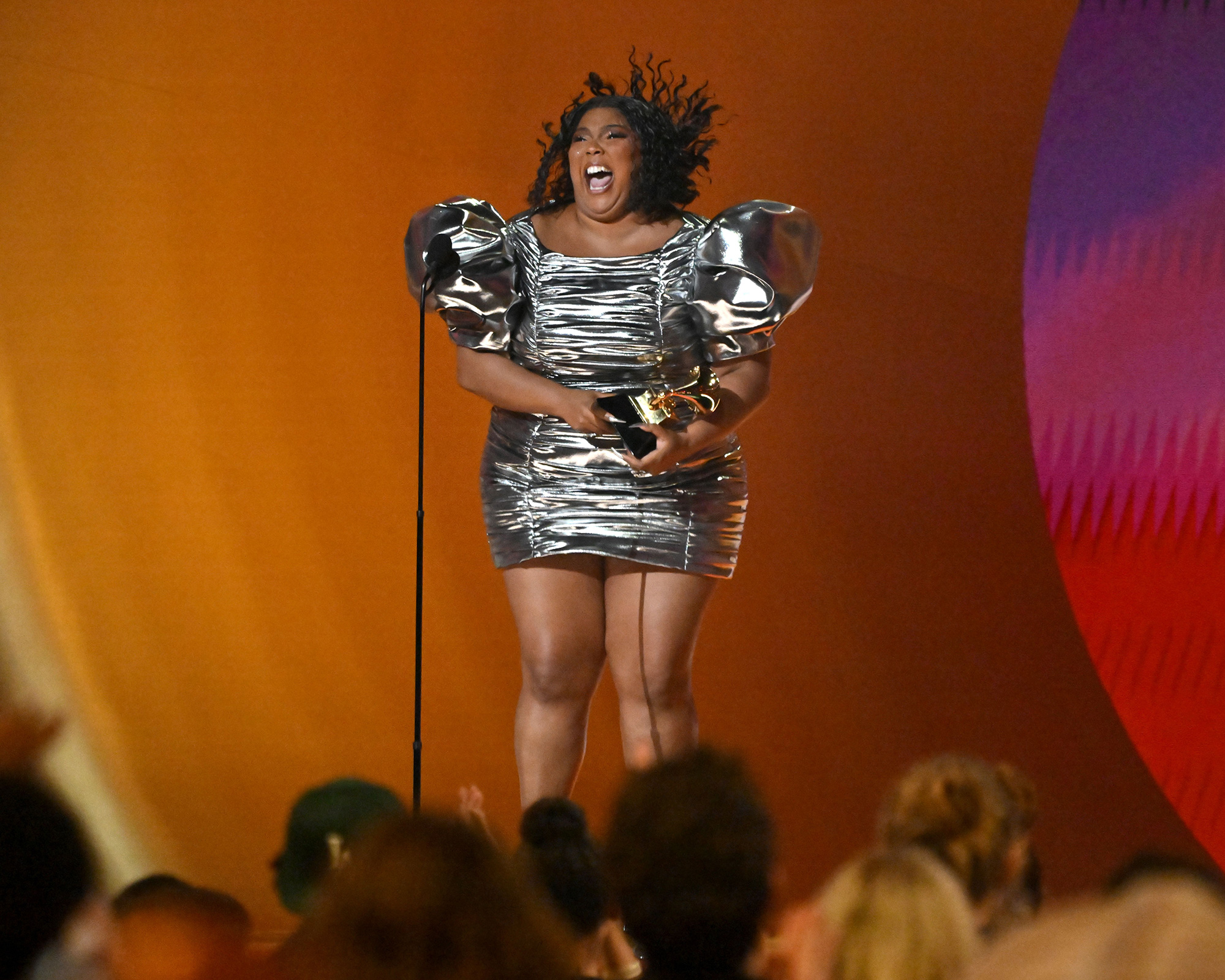 LIzzo accepts the award for Record of the Year.