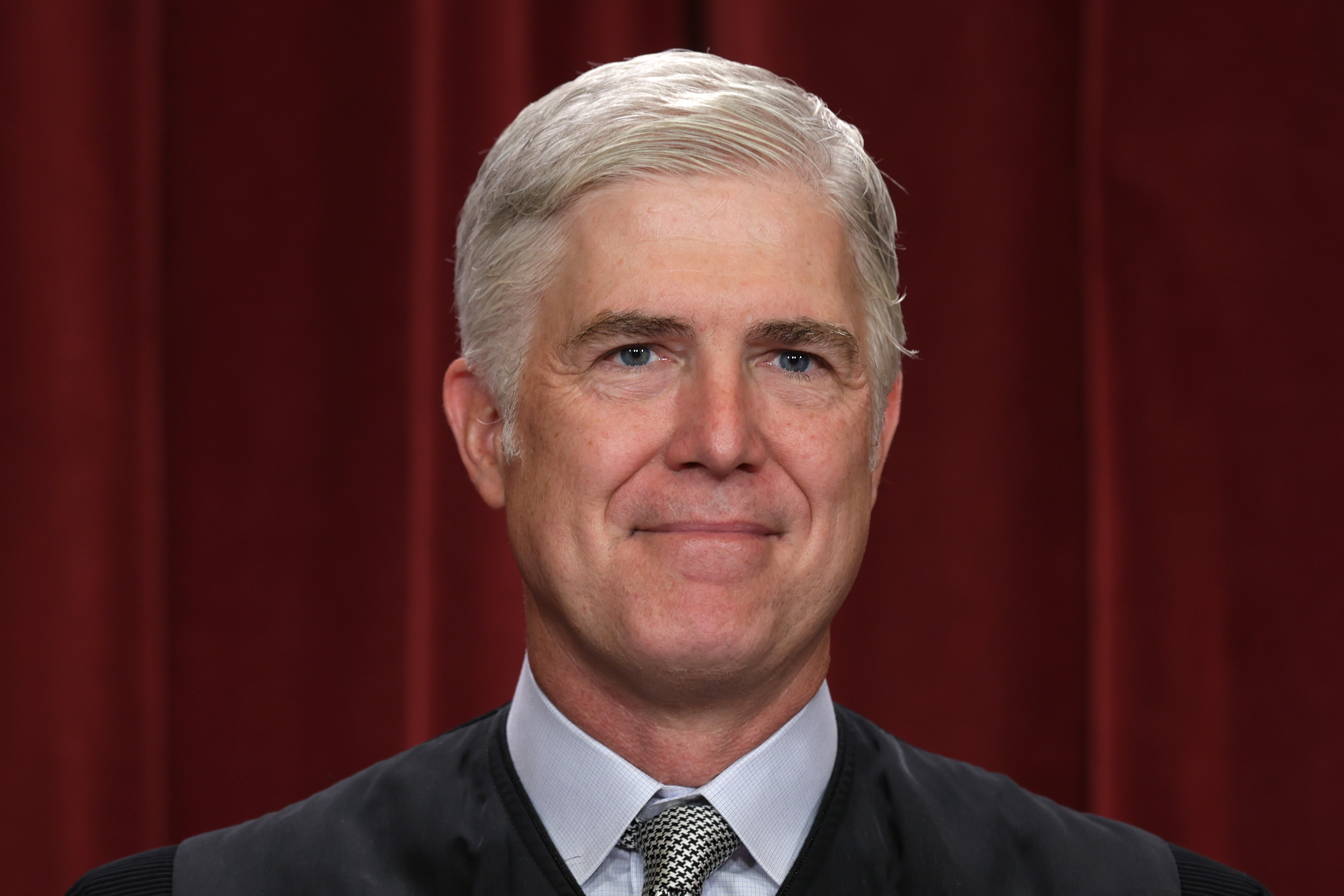 Justice Neil Gorsuch poses for an official portrait at the Supreme Court in Washington, DC, in 2022.