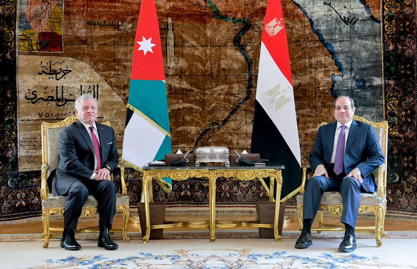 Jordan's King Abdullah II, left, and Egypt's President Abdel Fattah El-Sisi pose for photos in Cairo on Wednesday. 