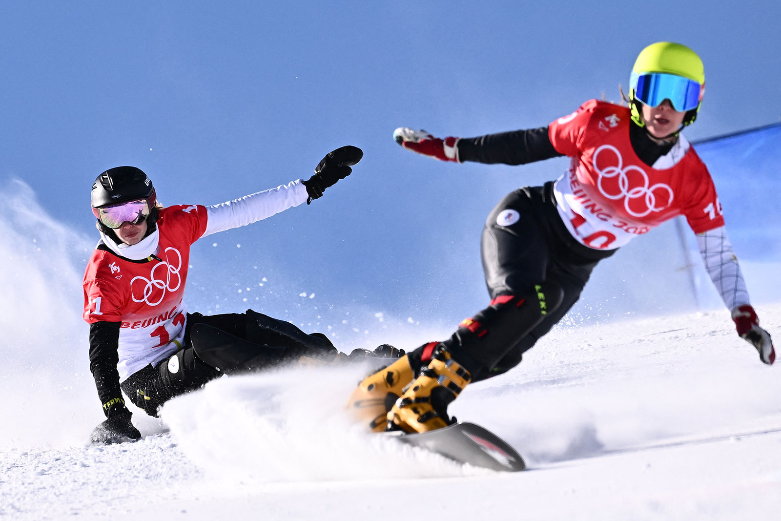 From left, ROC snowboarders Natalia Soboleva and Polina Smolentsova race in the women's parallel giant slalom on February 8.
