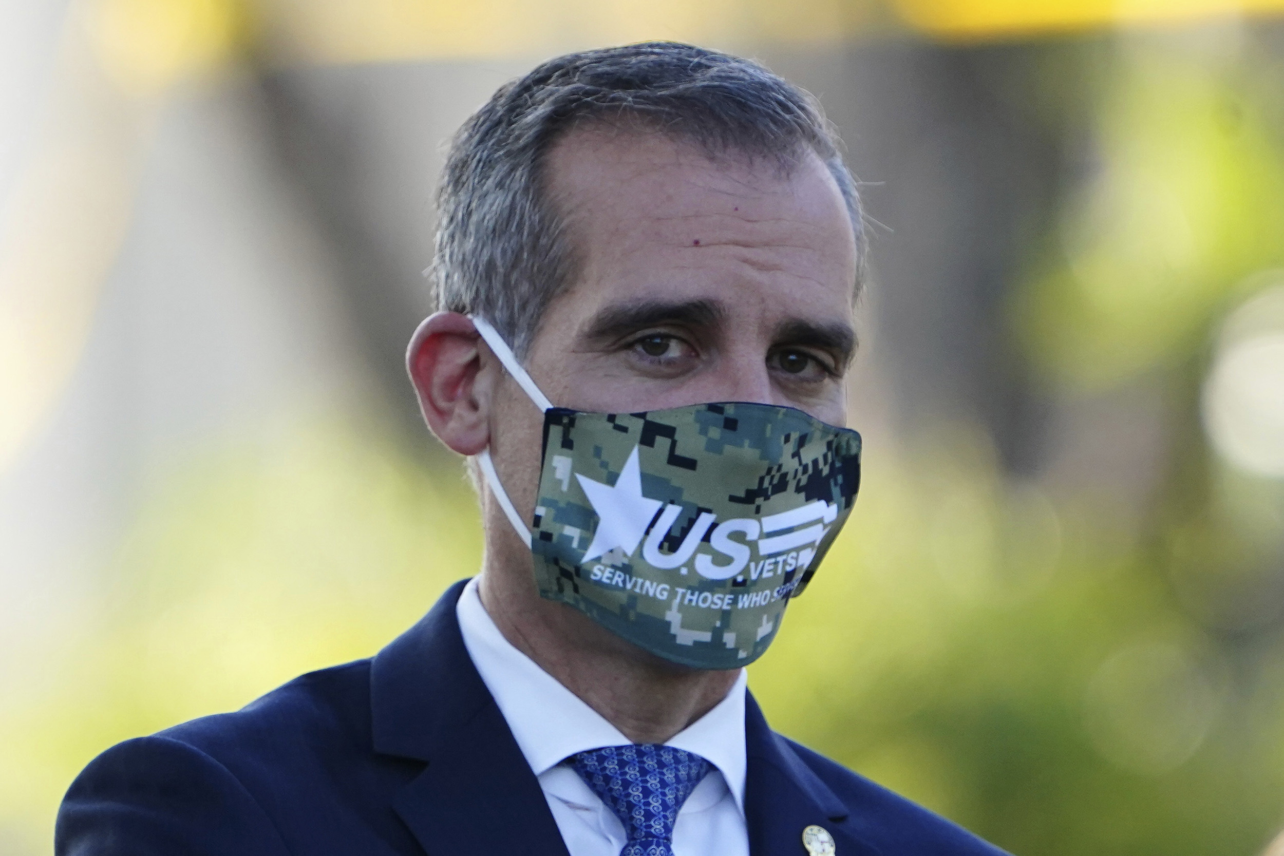 Los Angeles Mayor Eric Garcetti wears a face mask at a news conference at a coronavirus testing site at Lincoln Park, on August 5, in Los Angeles. 