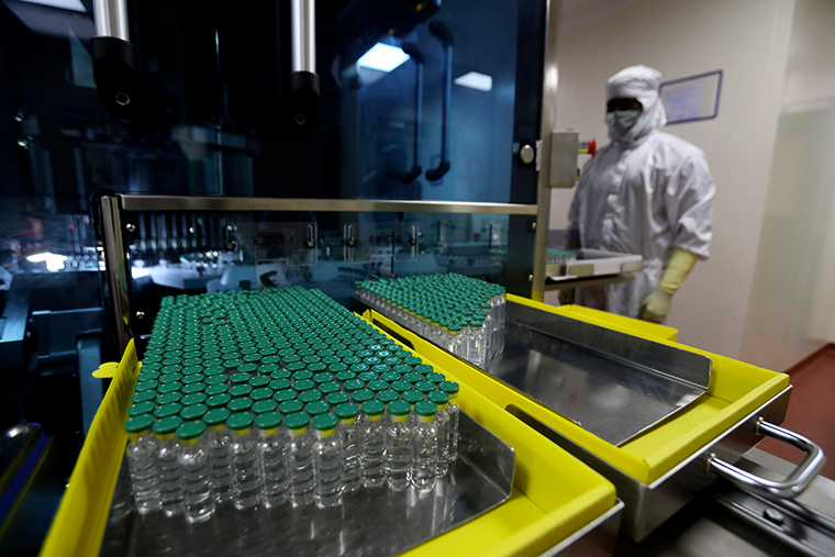 Vials of AstraZeneca's Covishield vaccine for COVID-19 are seen at a filling lab at the Serum Institute of India, Pune, India, Thursday, Jan. 21, 2021. 